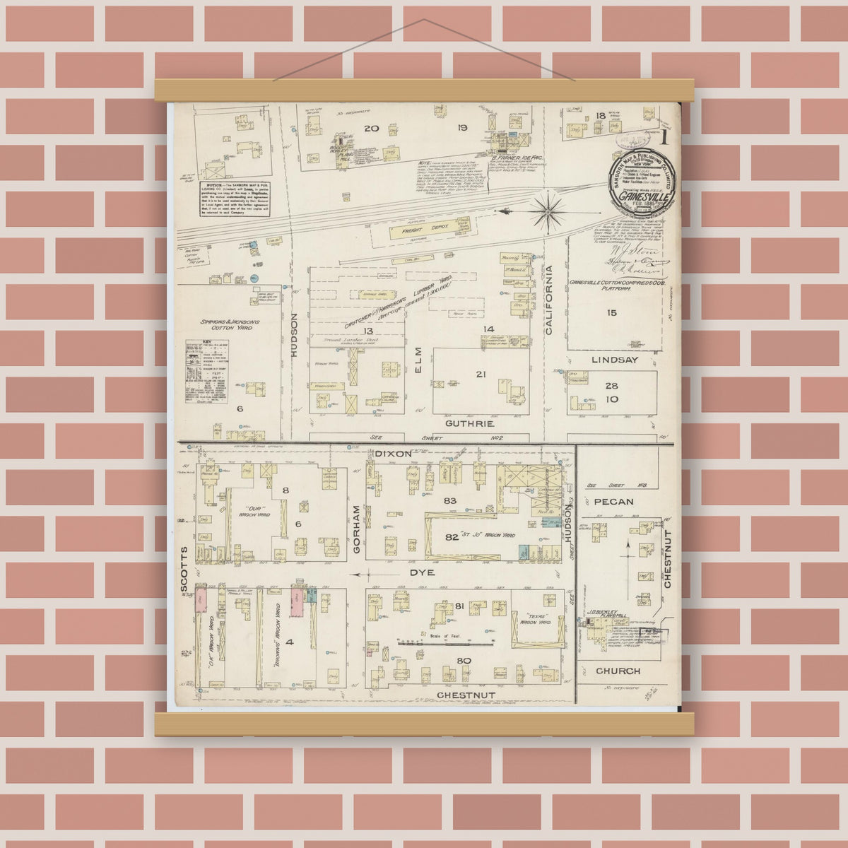 Old map wall art mockup — magnetic wood frame on brick wall — Sanborn Fire Insurance Map from Gainesville, Cooke County, Texas (1885) - Complete Map Set