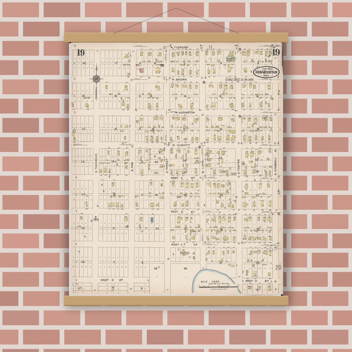 Old map wall art mockup — magnetic wood frame on brick wall — Sanborn Fire Insurance Map from Iron Mountain, Dickinson County, Michigan (1923), Sheet #0019