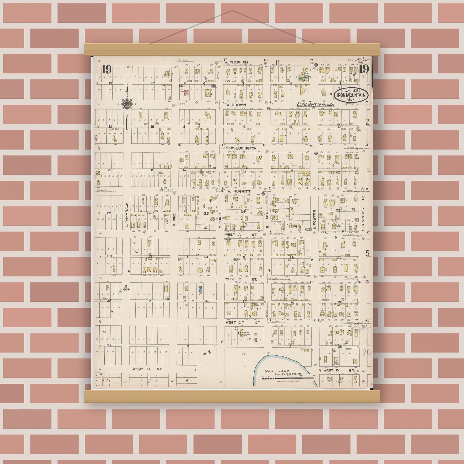 Old map wall art mockup — magnetic wood frame on brick wall — Sanborn Fire Insurance Map from Iron Mountain, Dickinson County, Michigan (1923), Sheet #0019