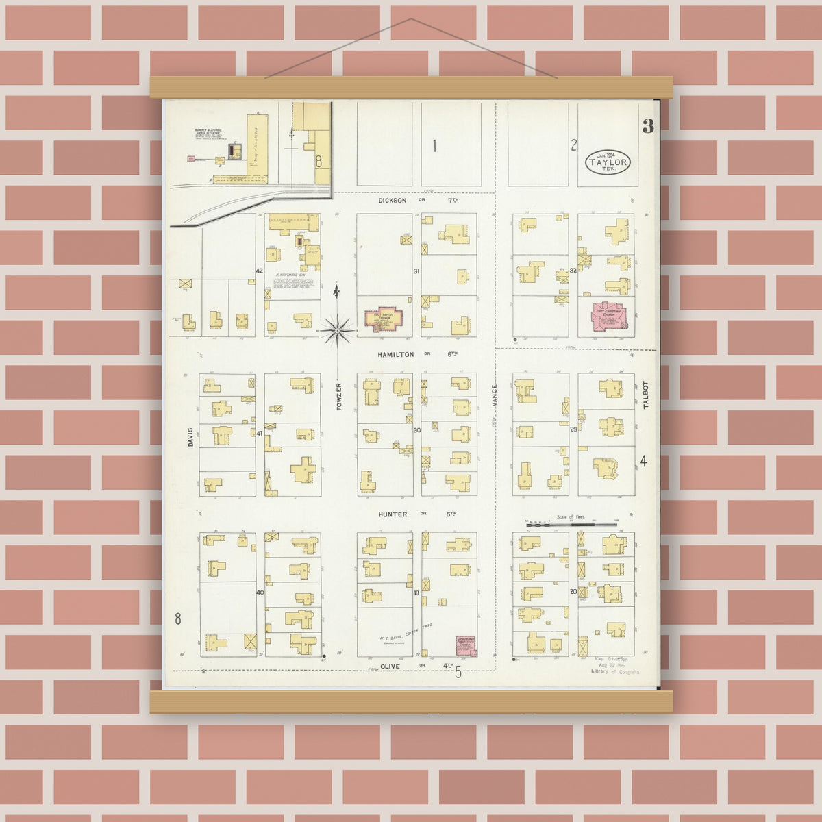Old map wall art mockup — magnetic wood frame on brick wall — Sanborn Fire Insurance Map from Taylor, Williamson County, Texas (1904), Sheet #0003