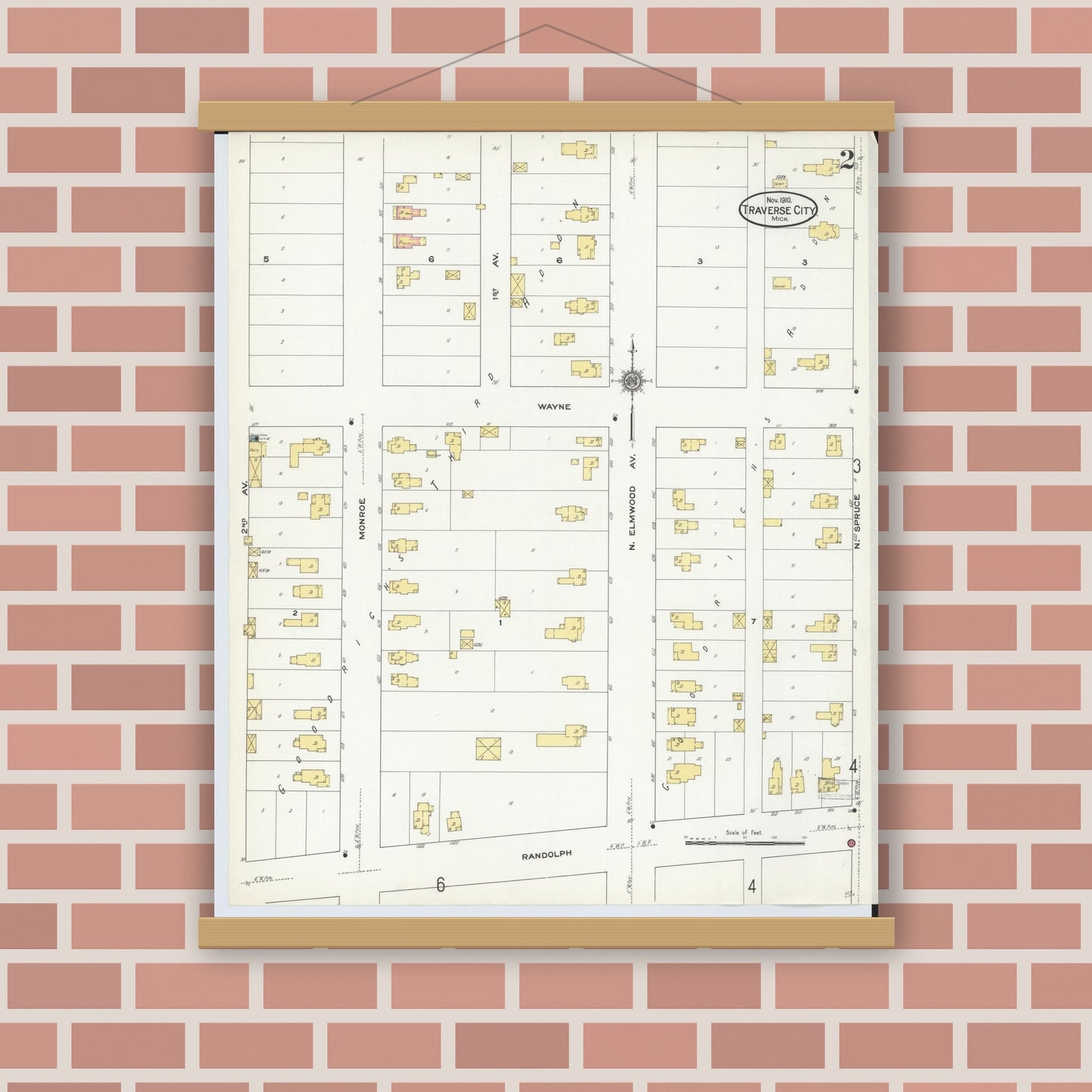 Old map wall art mockup — magnetic wood frame on brick wall — Sanborn Fire Insurance Map from Traverse City, Grand Traverse County, Michigan (1910), Sheet #0002
