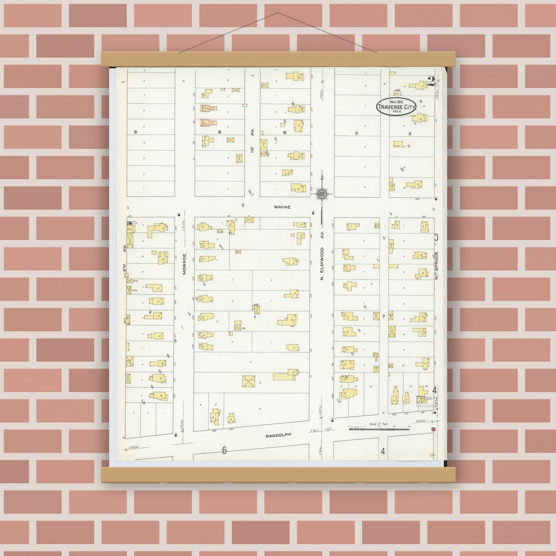 Old map wall art mockup — magnetic wood frame on brick wall — Sanborn Fire Insurance Map from Traverse City, Grand Traverse County, Michigan (1910), Sheet #0002