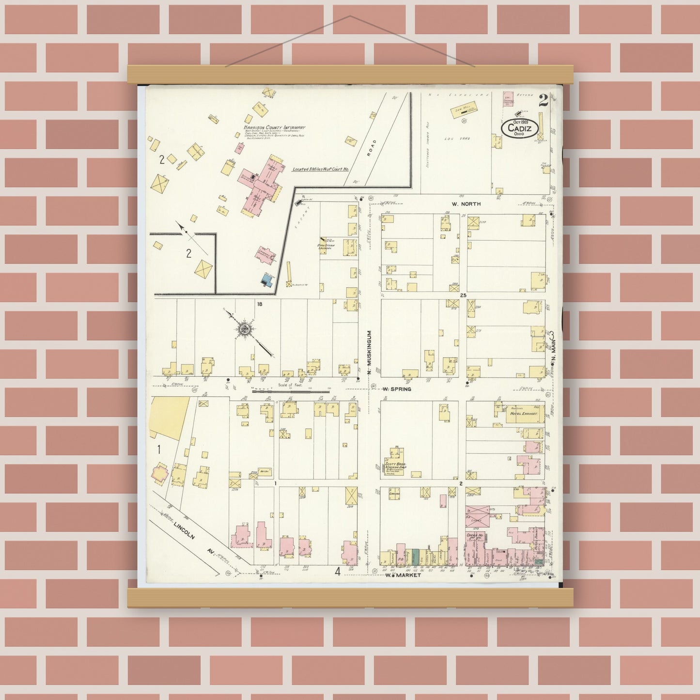 Old map wall art mockup — magnetic wood frame on brick wall — Sanborn Fire Insurance Map from Cadiz, Harrison County, Ohio (1909), Sheet #0002