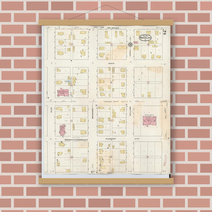 Old map wall art mockup — magnetic wood frame on brick wall — Sanborn Fire Insurance Map from Brooklyn, Poweshiek County, Iowa (1932), Sheet #0002