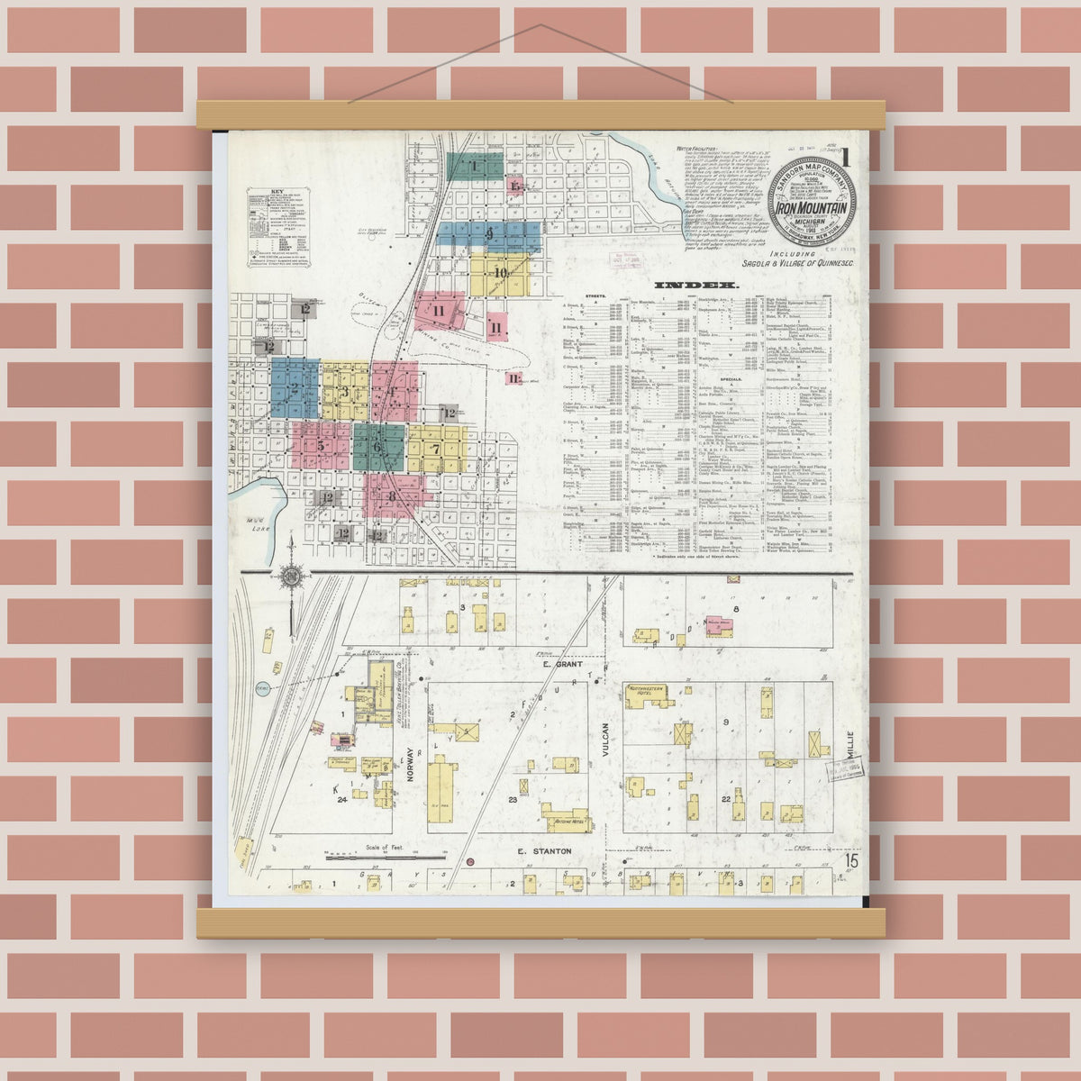 Old map wall art mockup — magnetic wood frame on brick wall — Sanborn Fire Insurance Map from Iron Mountain, Dickinson County, Michigan (1911), Sheet #0001