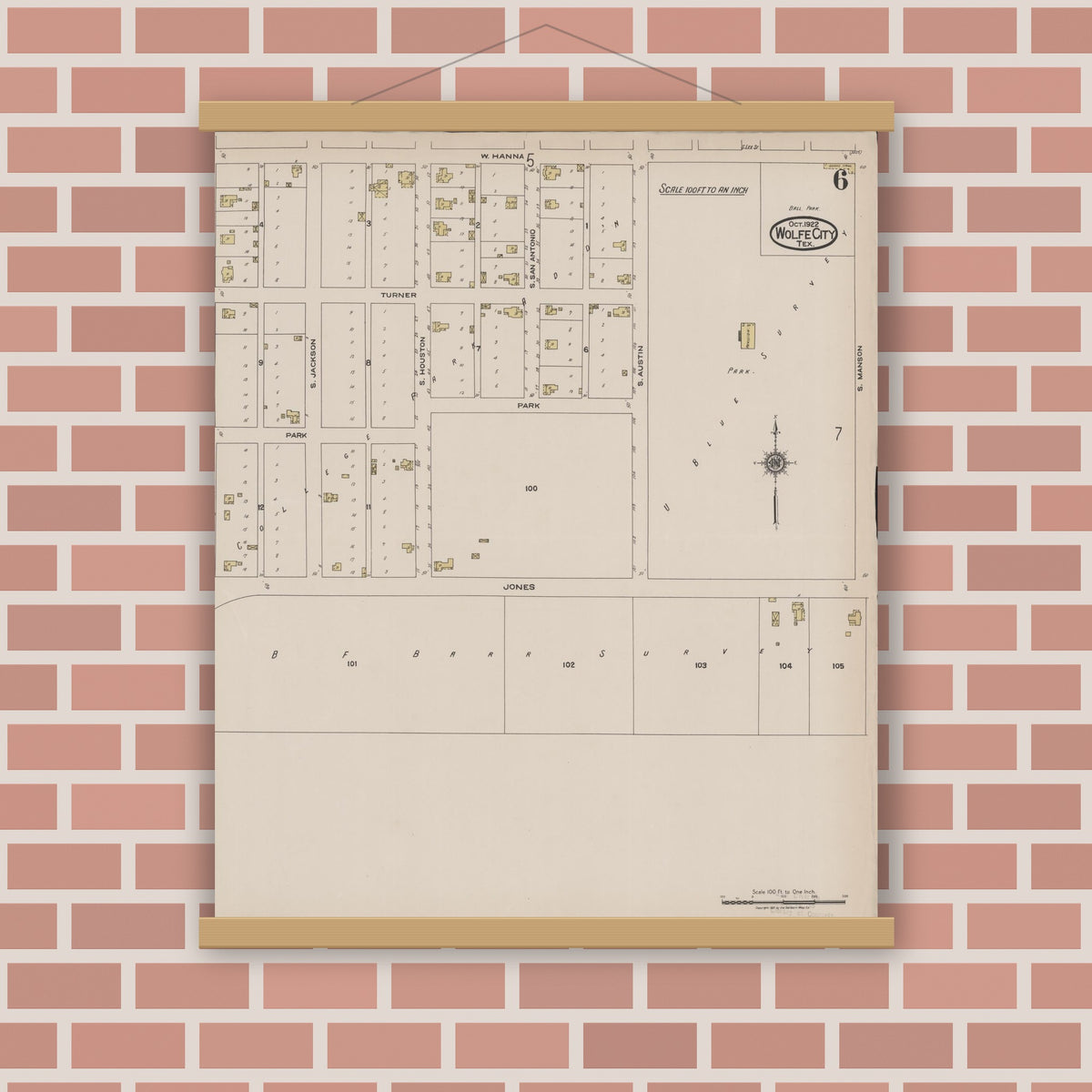 Old map wall art mockup — magnetic wood frame on brick wall — Sanborn Fire Insurance Map from Wolfe City, Hunt County, Texas (1922), Sheet #0006
