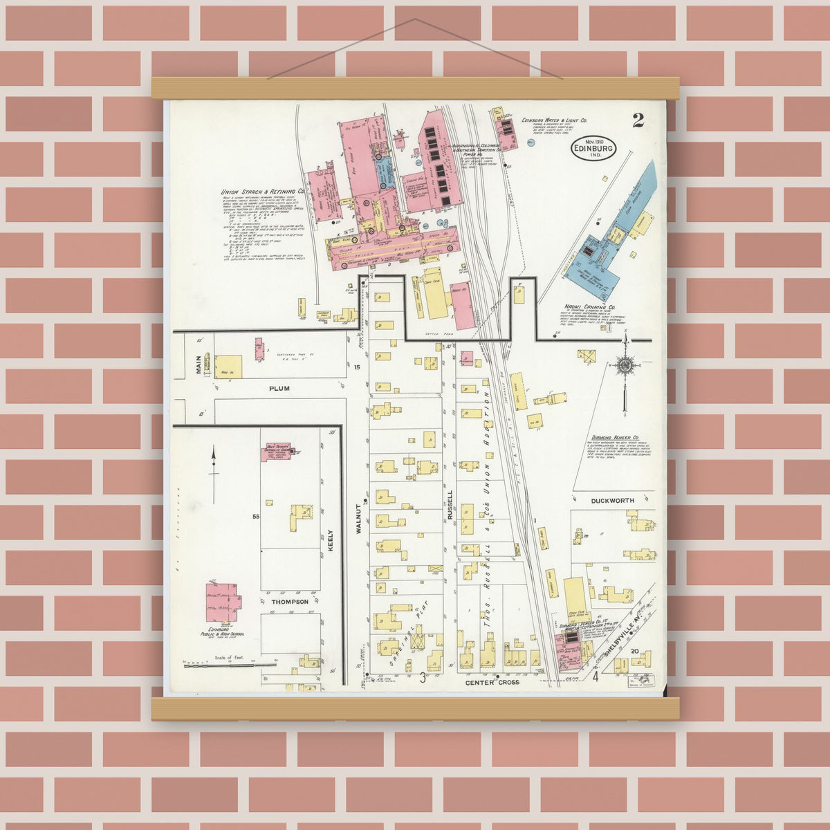 Old map wall art mockup — magnetic wood frame on brick wall — Sanborn Fire Insurance Map from Edinburg, Johnson And Bartholomew Counties, Indiana (1910), Sheet #0002