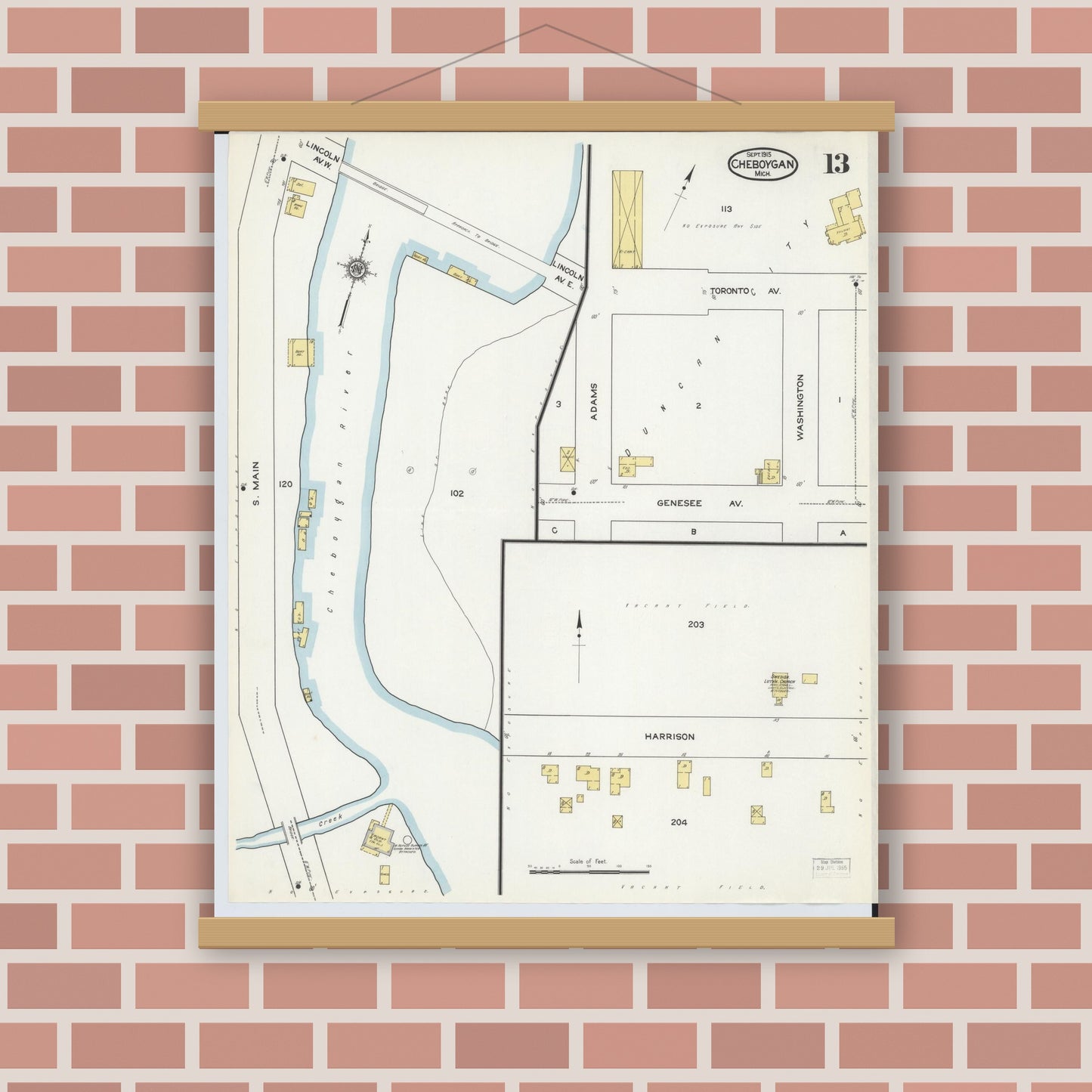 Old map wall art mockup — magnetic wood frame on brick wall — Sanborn Fire Insurance Map from Cheboygan, Cheboygan County, Michigan (1915), Sheet #0013