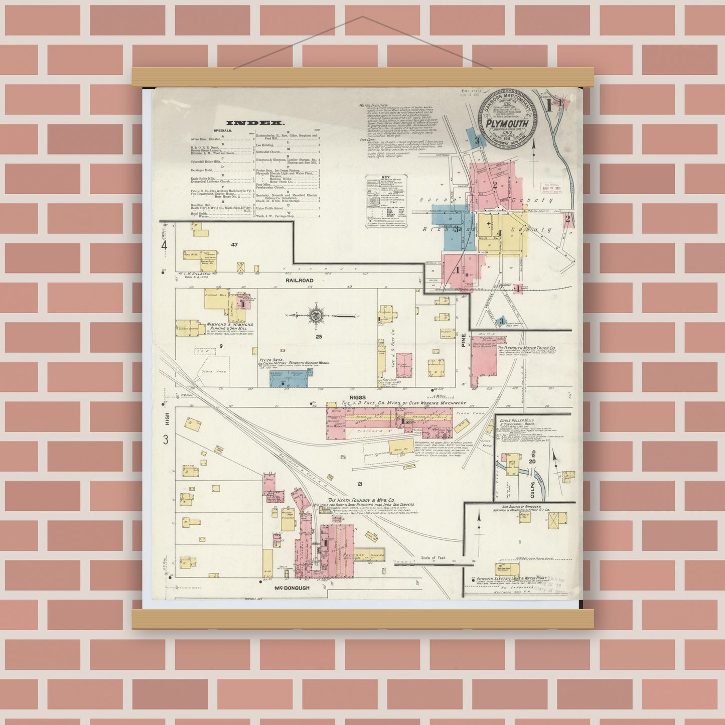 Old map wall art mockup — magnetic wood frame on brick wall — Sanborn Fire Insurance Map from Plymouth, Huron And Richland Counties, Ohio (1911), Sheet #0001