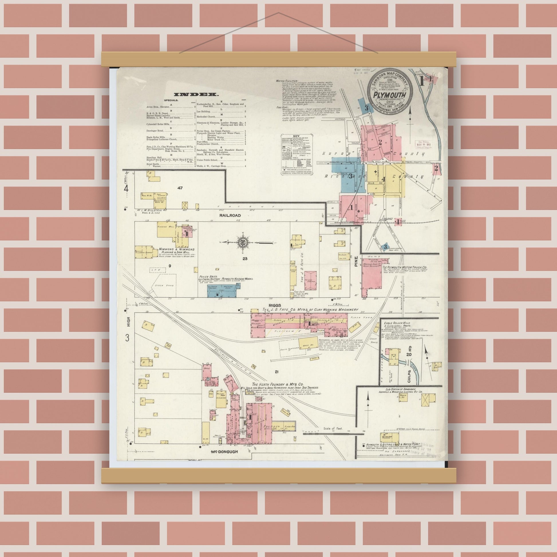 Old map wall art mockup — magnetic wood frame on brick wall — Sanborn Fire Insurance Map from Plymouth, Huron And Richland Counties, Ohio (1911), Sheet #0001