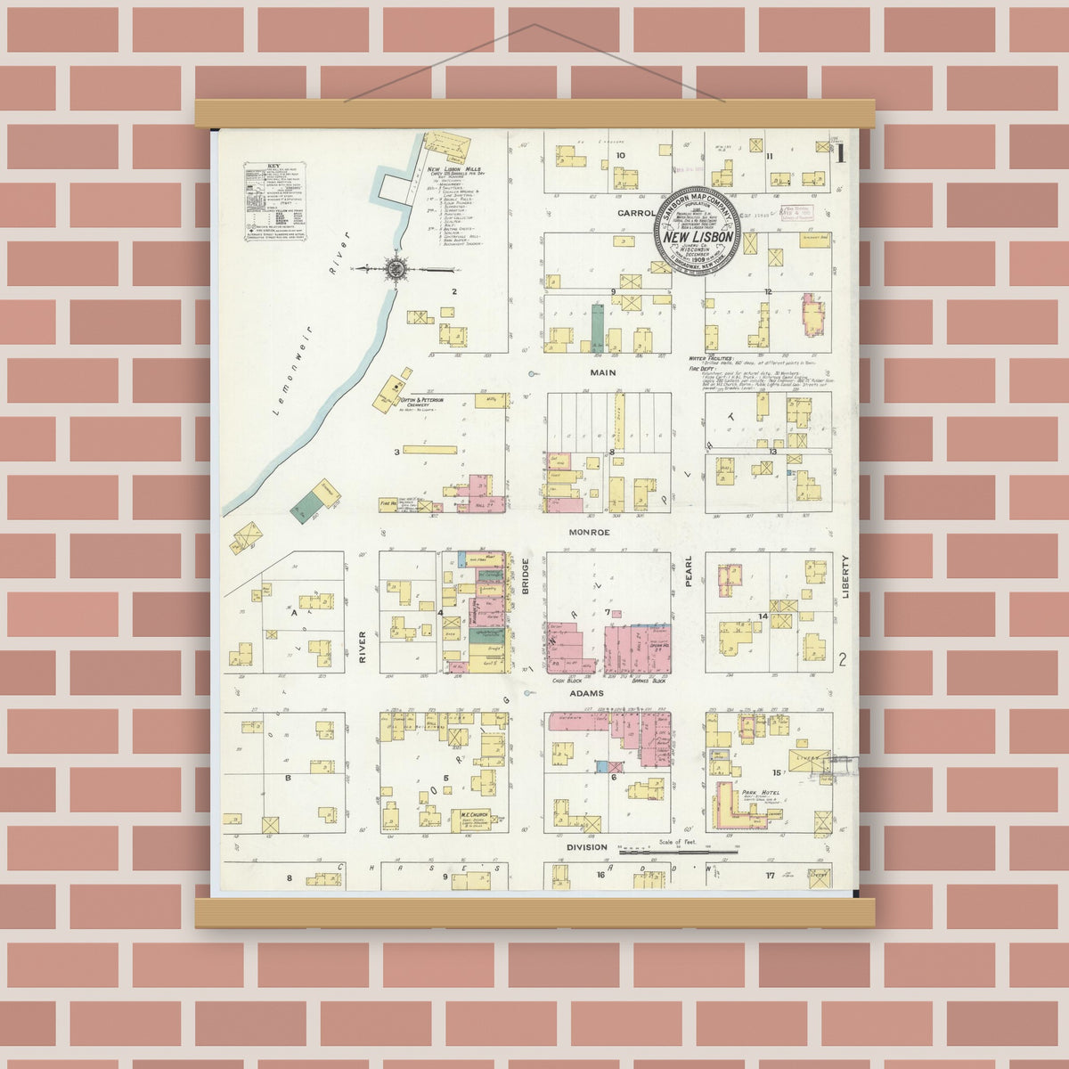 Old map wall art mockup — magnetic wood frame on brick wall — Sanborn Fire Insurance Map from New Lisbon, Juneau County, Wisconsin (1909), Sheet #0001