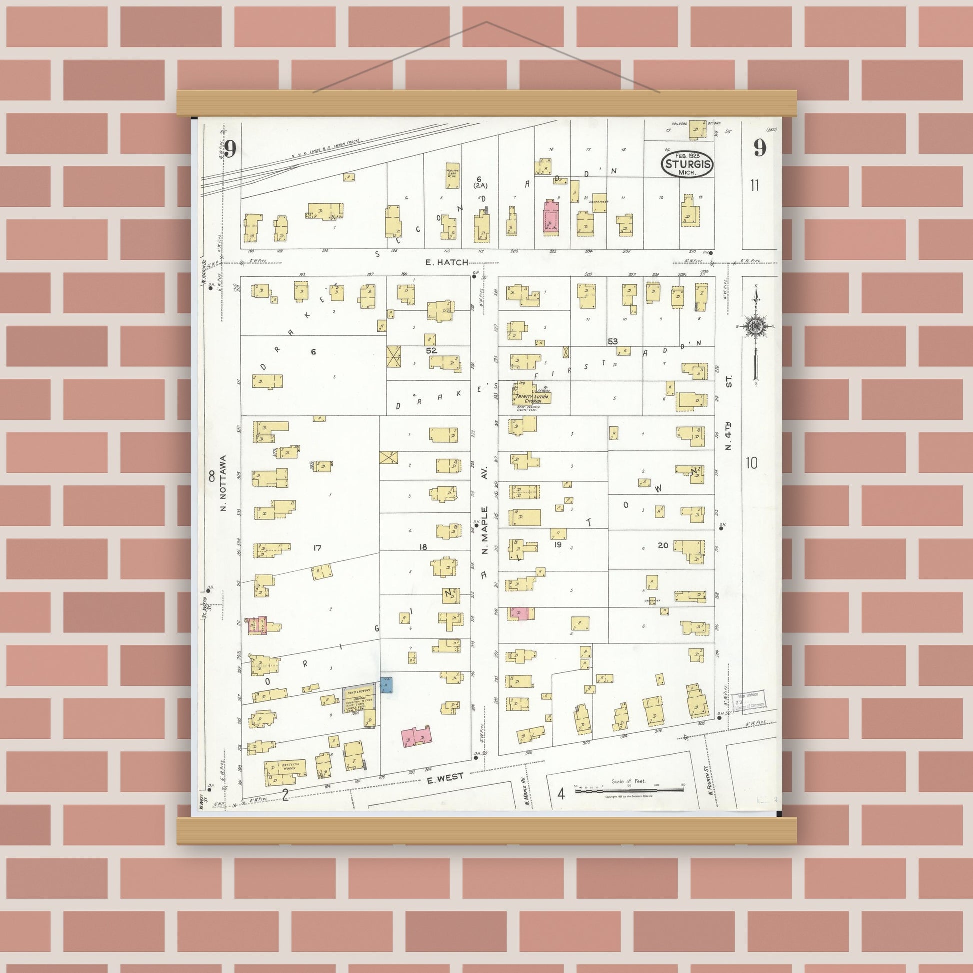 Old map wall art mockup — magnetic wood frame on brick wall — Sanborn Fire Insurance Map from Sturgis, Saint Joseph County, Michigan (1923), Sheet #0009