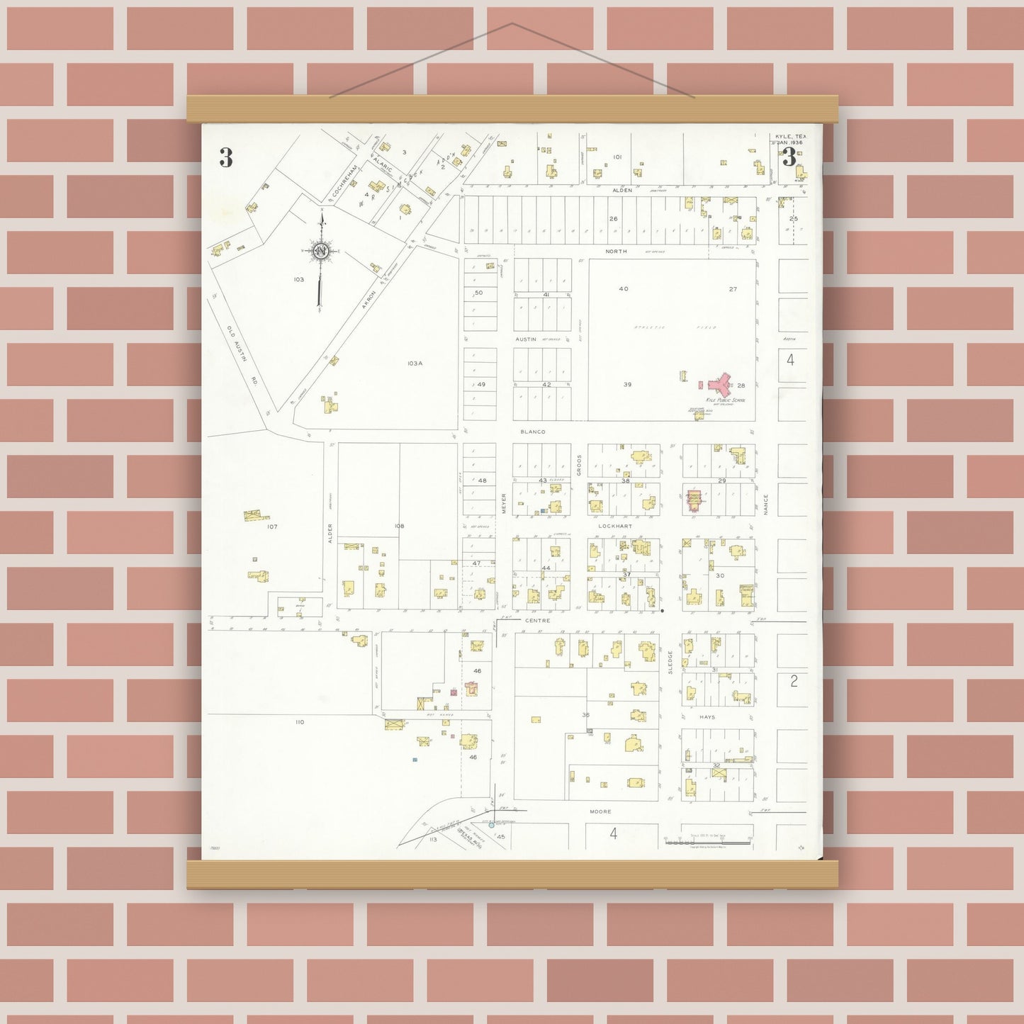 Old map wall art mockup — magnetic wood frame on brick wall — Sanborn Fire Insurance Map from Kyle, Hays County, Texas (1936), Sheet #0003