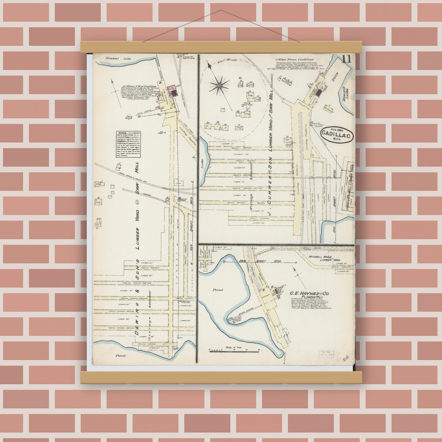 Old map wall art mockup — magnetic wood frame on brick wall — Sanborn Fire Insurance Map from Cadillac, Wexford County, Michigan (1884), Sheet #0011