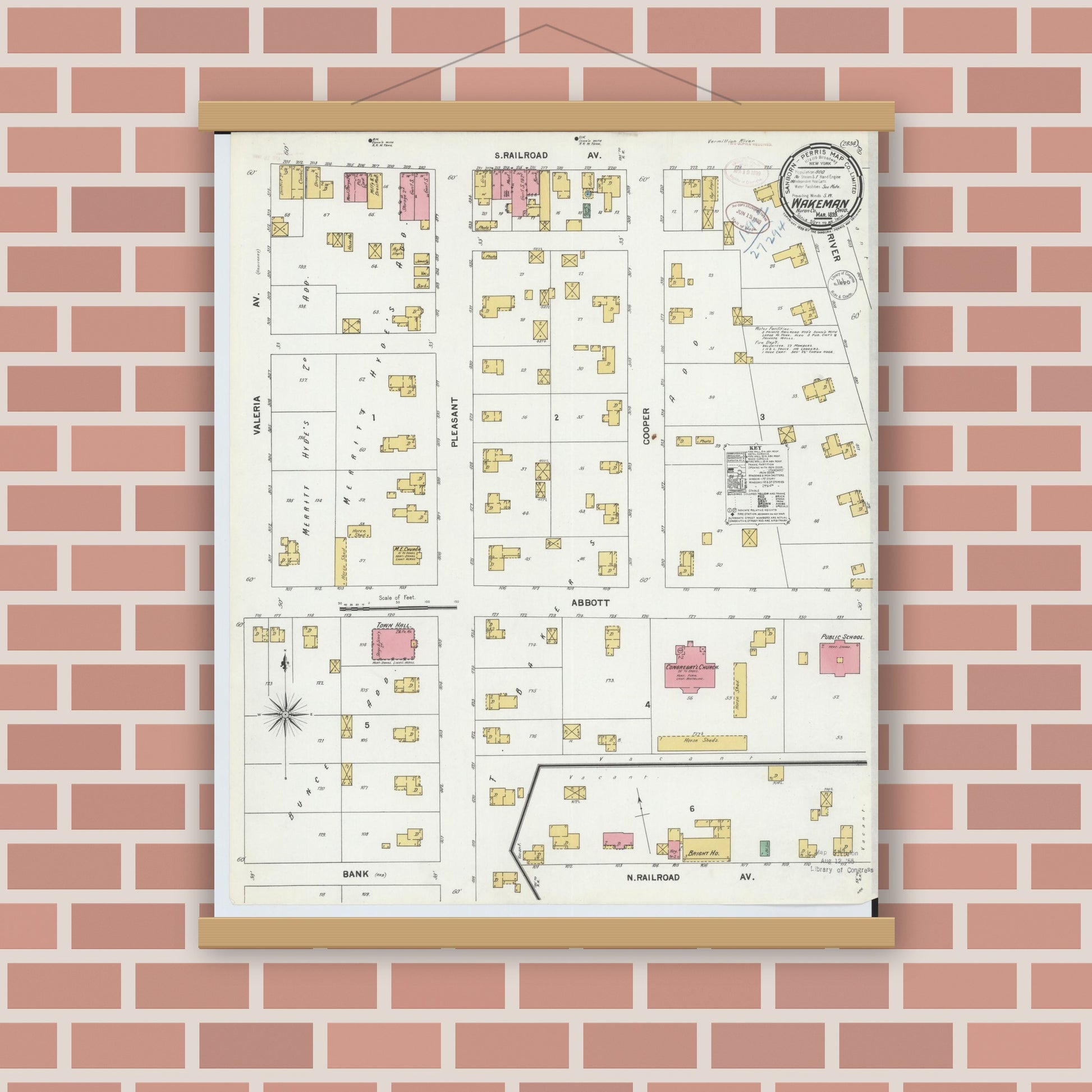 Old map wall art mockup — magnetic wood frame on brick wall — Sanborn Fire Insurance Map from Wakeman, Huron County, Ohio (1899), Sheet #0001