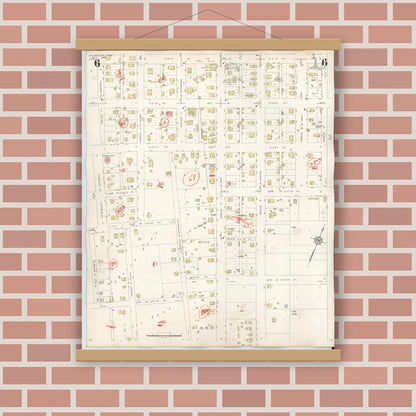 Old map wall art mockup — magnetic wood frame on brick wall — Sanborn Fire Insurance Map from McGregor, McLennan County, Texas (1942), Sheet #0006