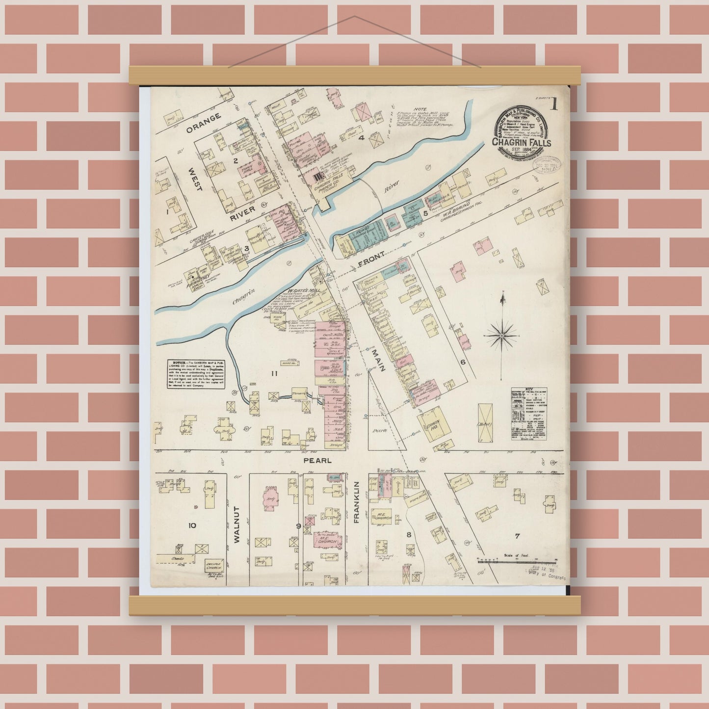 Old map wall art mockup — magnetic wood frame on brick wall — Sanborn Fire Insurance Map from Chagrin Falls, Cuyahoga County, Ohio (1884), Sheet #0001