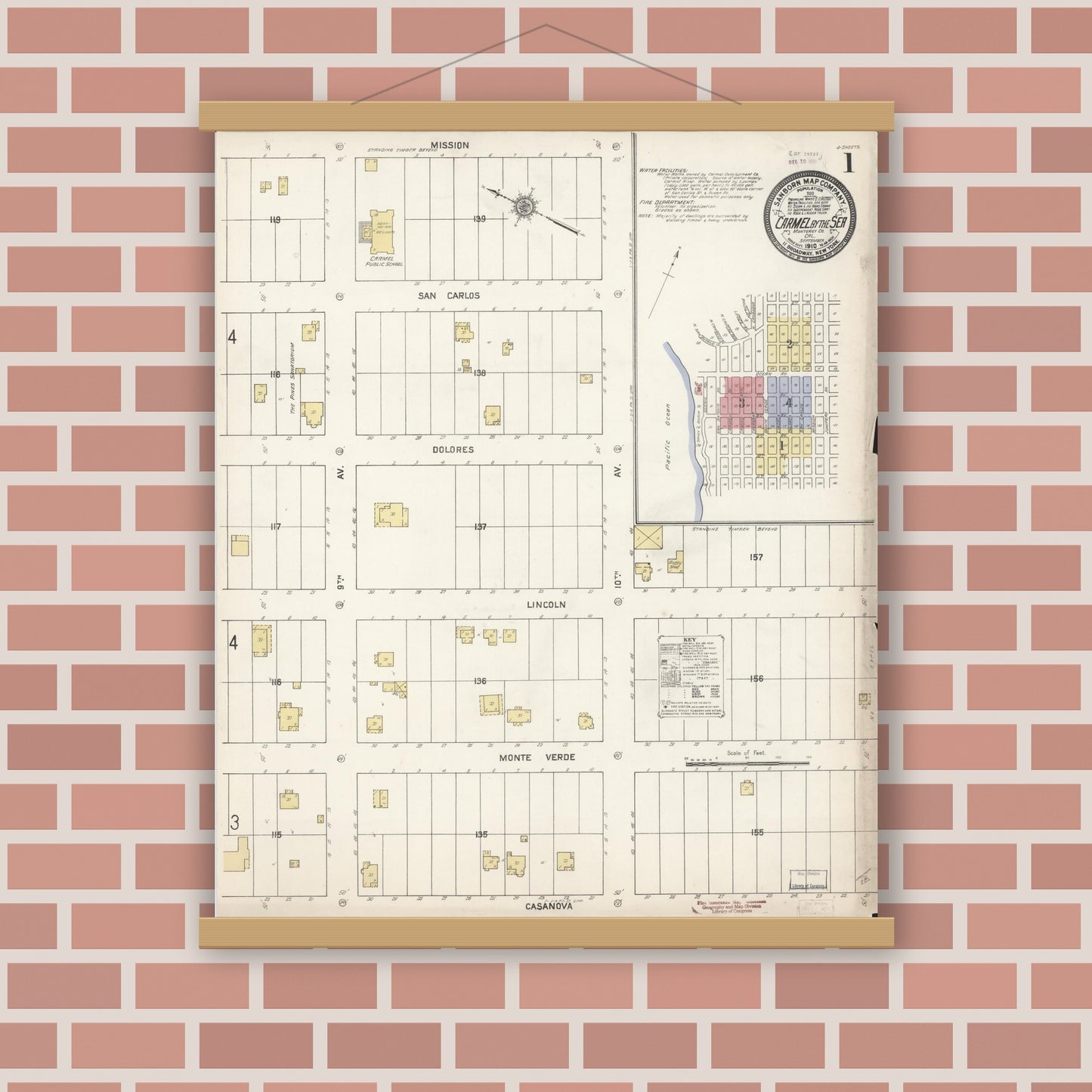 Old map wall art mockup — magnetic wood frame on brick wall — Sanborn Fire Insurance Map from Carmel By The Sea, Monterey County, California (1910), Sheet #0001