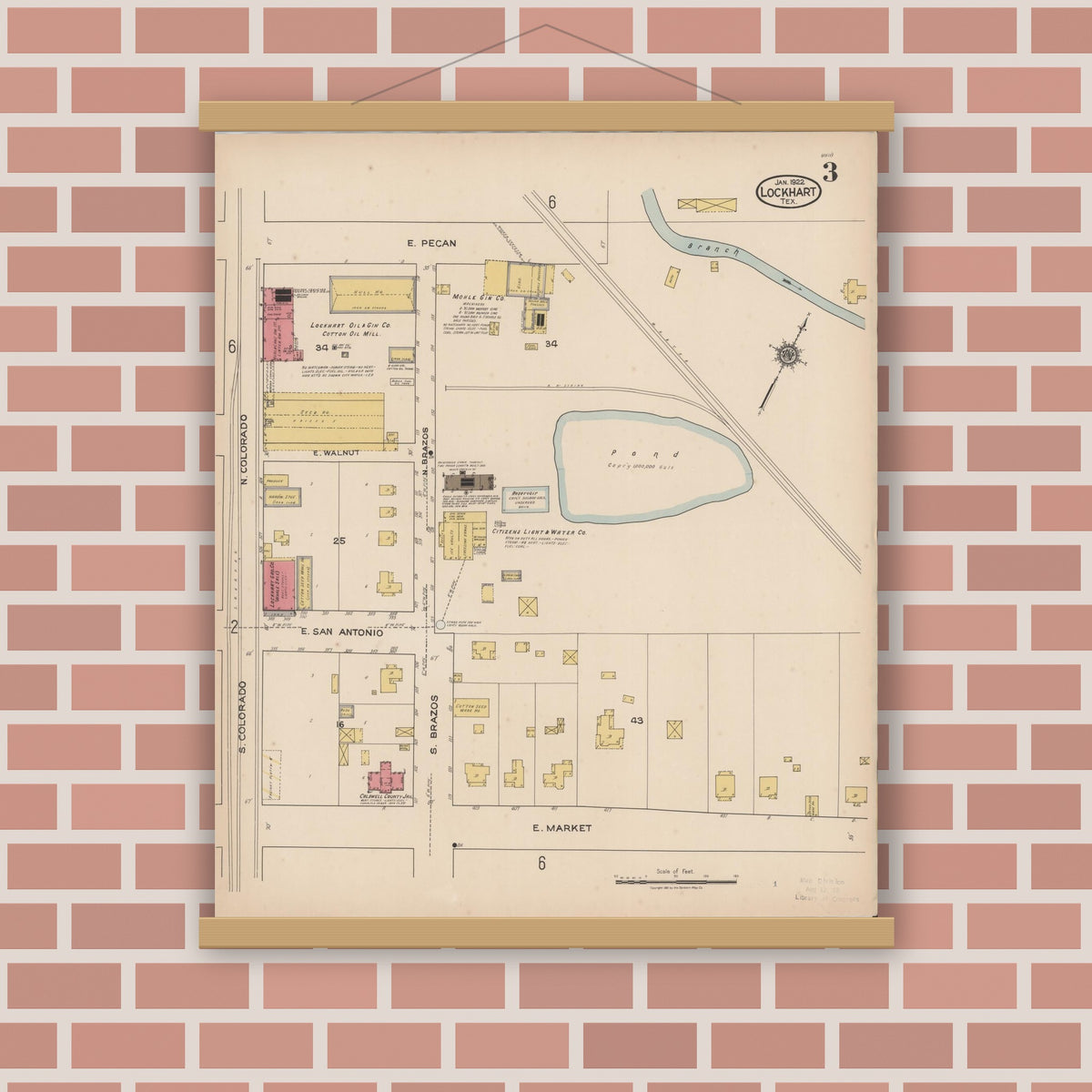 Old map wall art mockup — magnetic wood frame on brick wall — Sanborn Fire Insurance Map from Lockhart, Caldwell County, Texas (1922), Sheet #0003