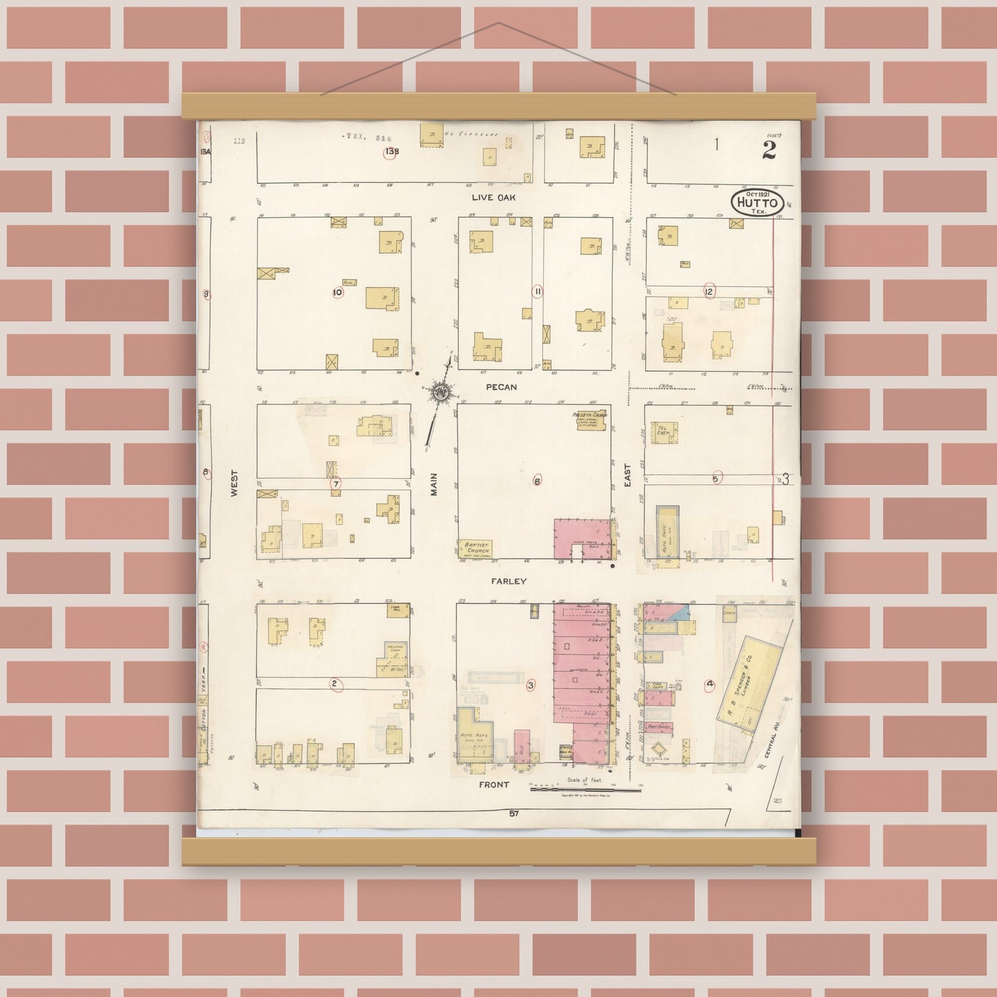 Old map wall art mockup — magnetic wood frame on brick wall — Sanborn Fire Insurance Map from Hutto, Williamson County, Texas (1937), Sheet #0002
