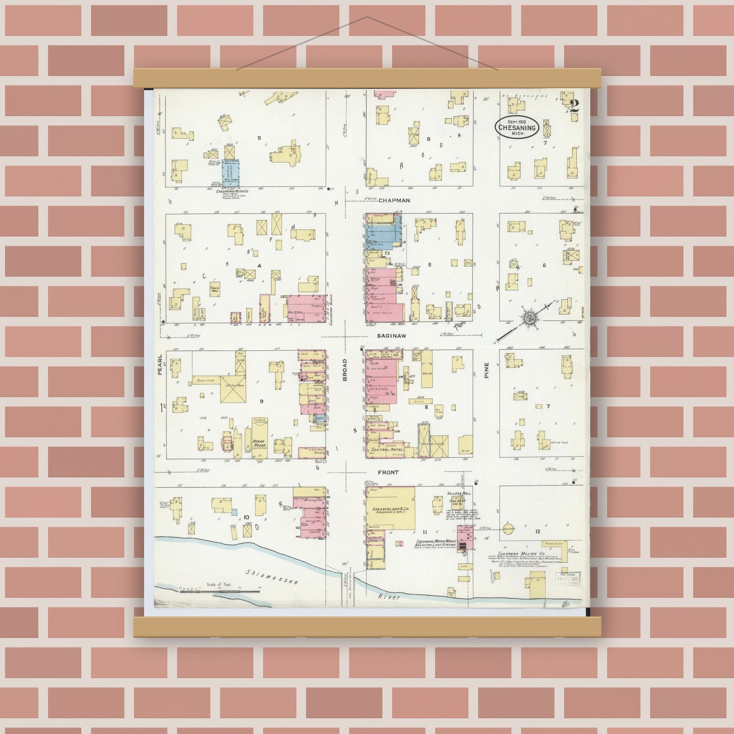 Old map wall art mockup — magnetic wood frame on brick wall — Sanborn Fire Insurance Map from Chesaning, Saginaw County, Michigan (1910), Sheet #0002