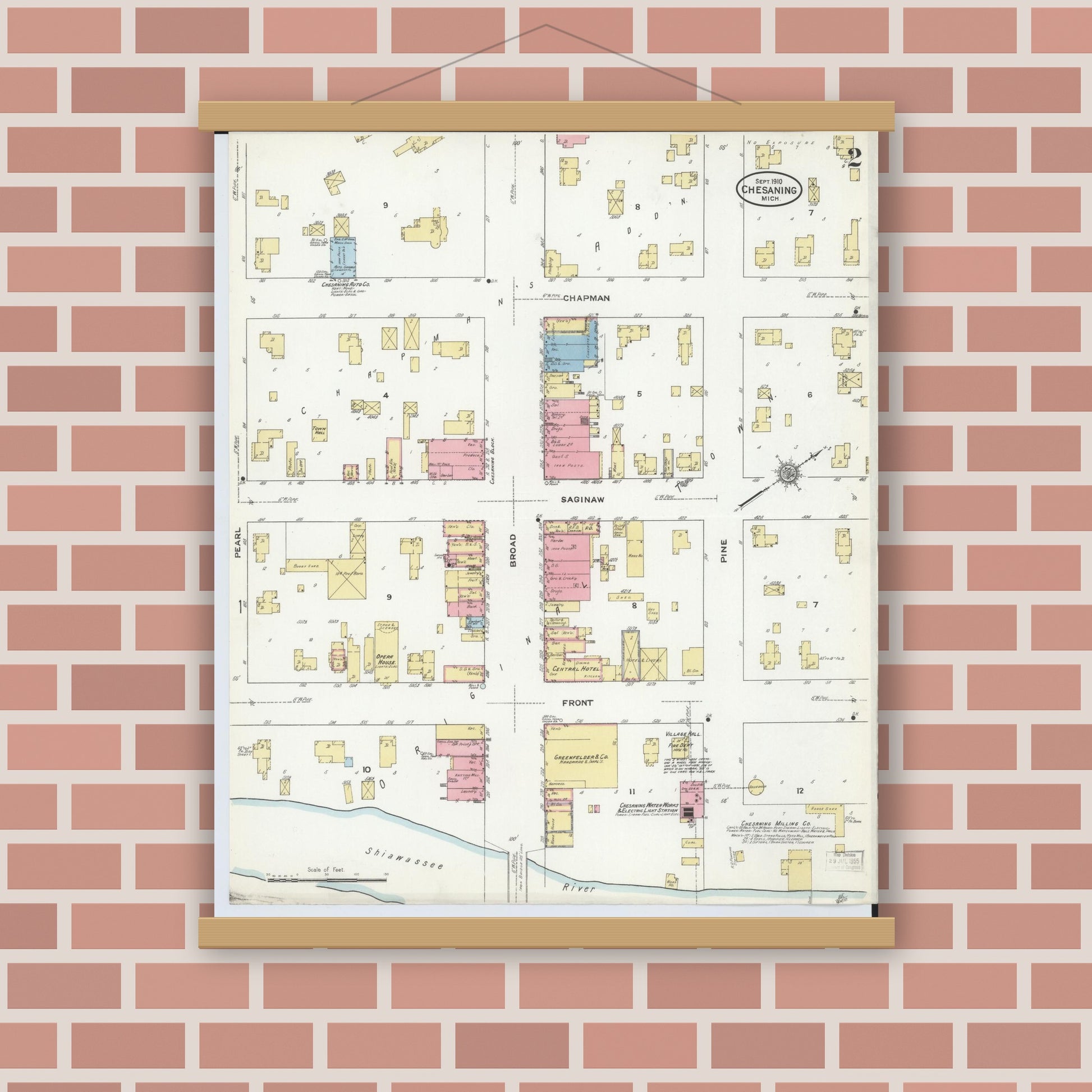 Old map wall art mockup — magnetic wood frame on brick wall — Sanborn Fire Insurance Map from Chesaning, Saginaw County, Michigan (1910), Sheet #0002