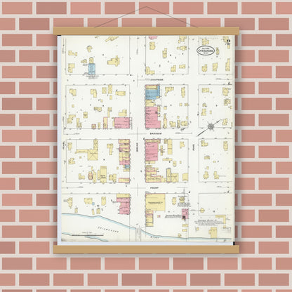 Old map wall art mockup — magnetic wood frame on brick wall — Sanborn Fire Insurance Map from Chesaning, Saginaw County, Michigan (1910), Sheet #0002