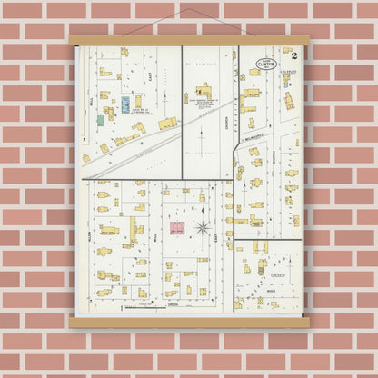 Old map wall art mockup — magnetic wood frame on brick wall — Sanborn Fire Insurance Map from Clinton, Rock County, Wisconsin (1899), Sheet #0002
