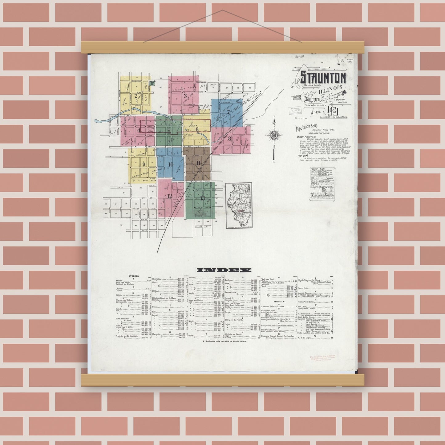 Old map wall art mockup — magnetic wood frame on brick wall — Sanborn Fire Insurance Map from Staunton, Macoupin County, Illinois (1921), Sheet #0001