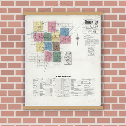 Old map wall art mockup — magnetic wood frame on brick wall — Sanborn Fire Insurance Map from Staunton, Macoupin County, Illinois (1921), Sheet #0001