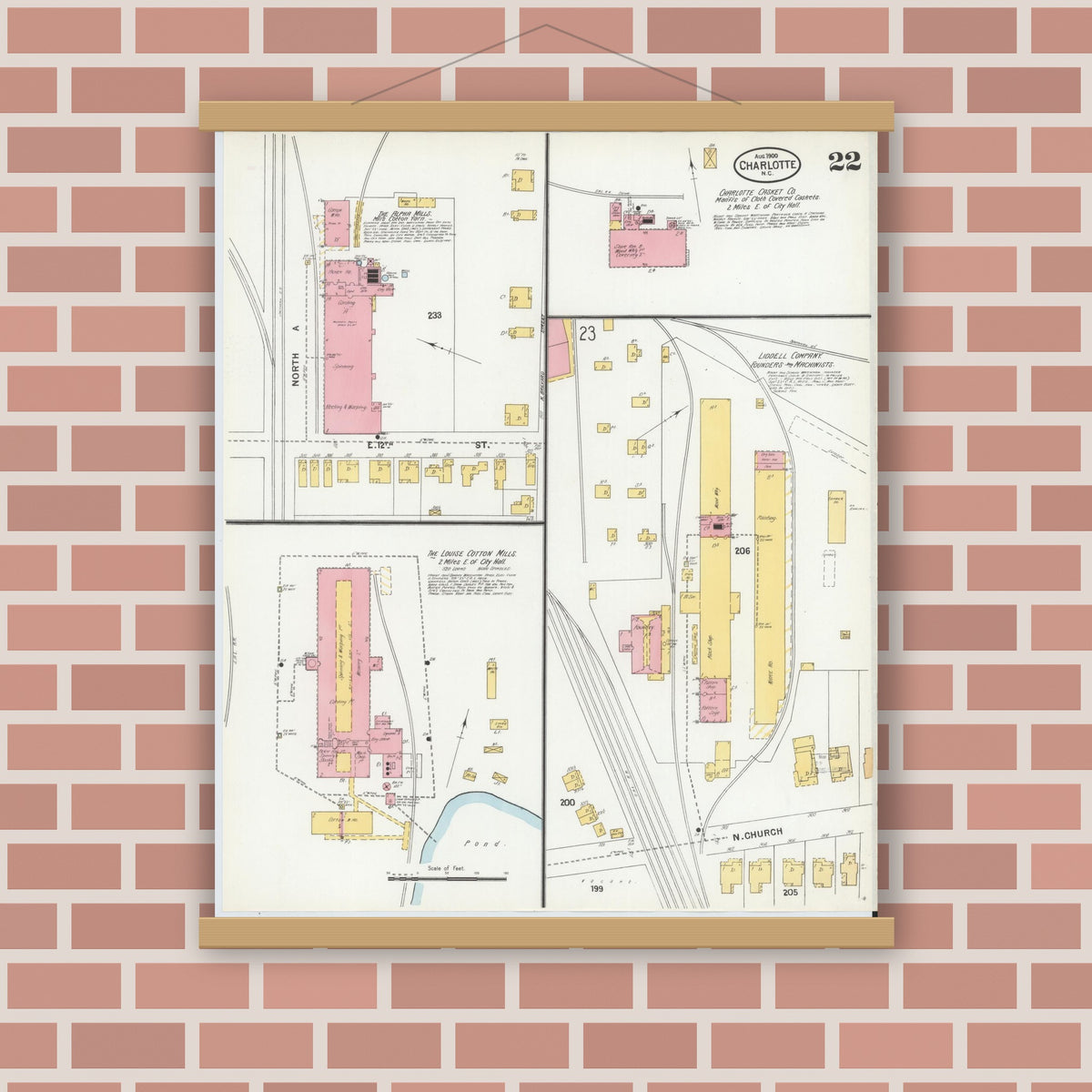 Old map wall art mockup — magnetic wood frame on brick wall — Sanborn Fire Insurance Map from Charlotte, Mecklenburg County, North Carolina (1900), Sheet #0022