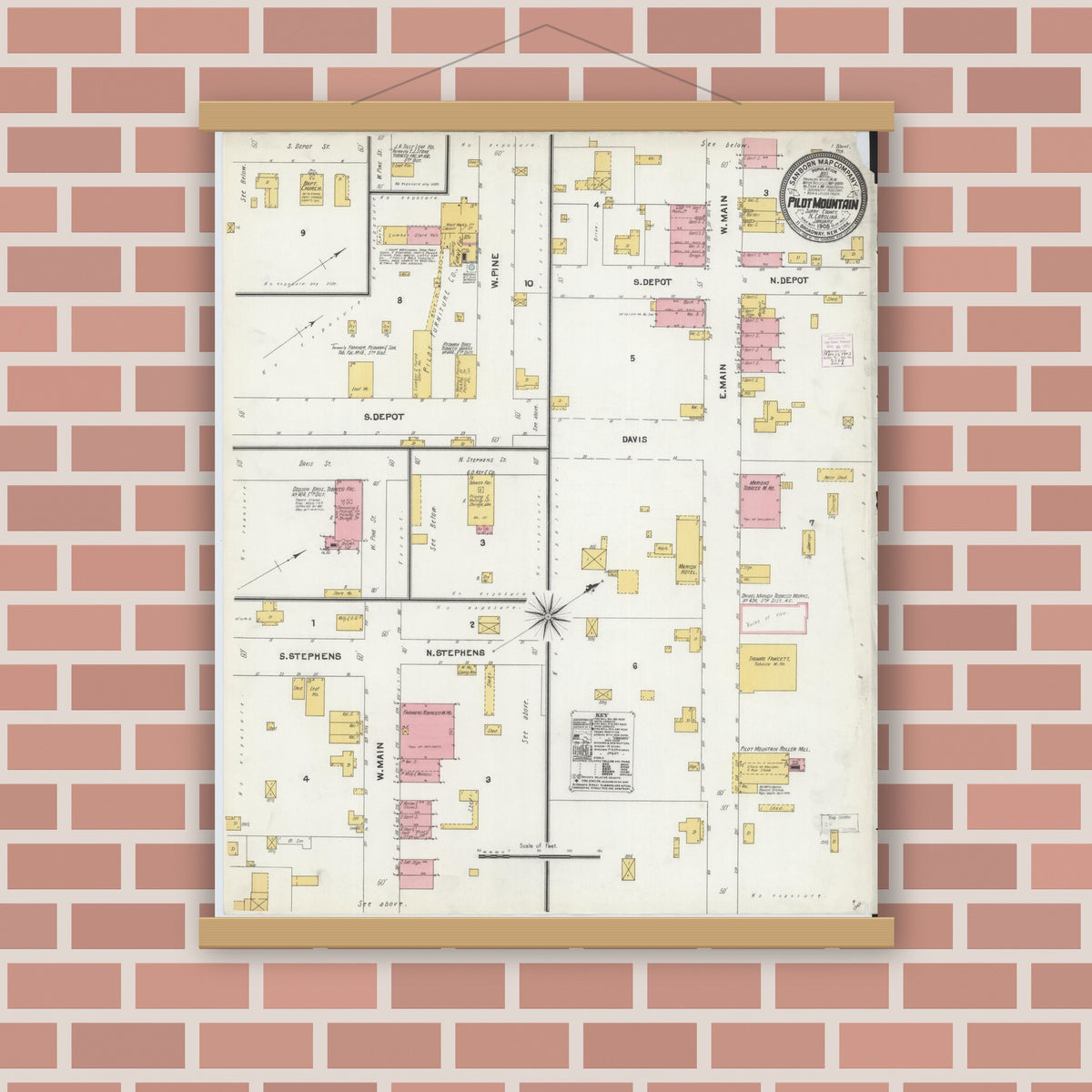 Old map wall art mockup — magnetic wood frame on brick wall — Sanborn Fire Insurance Map from Pilot Mountain, Surry County, North Carolina (1905), Sheet #0001