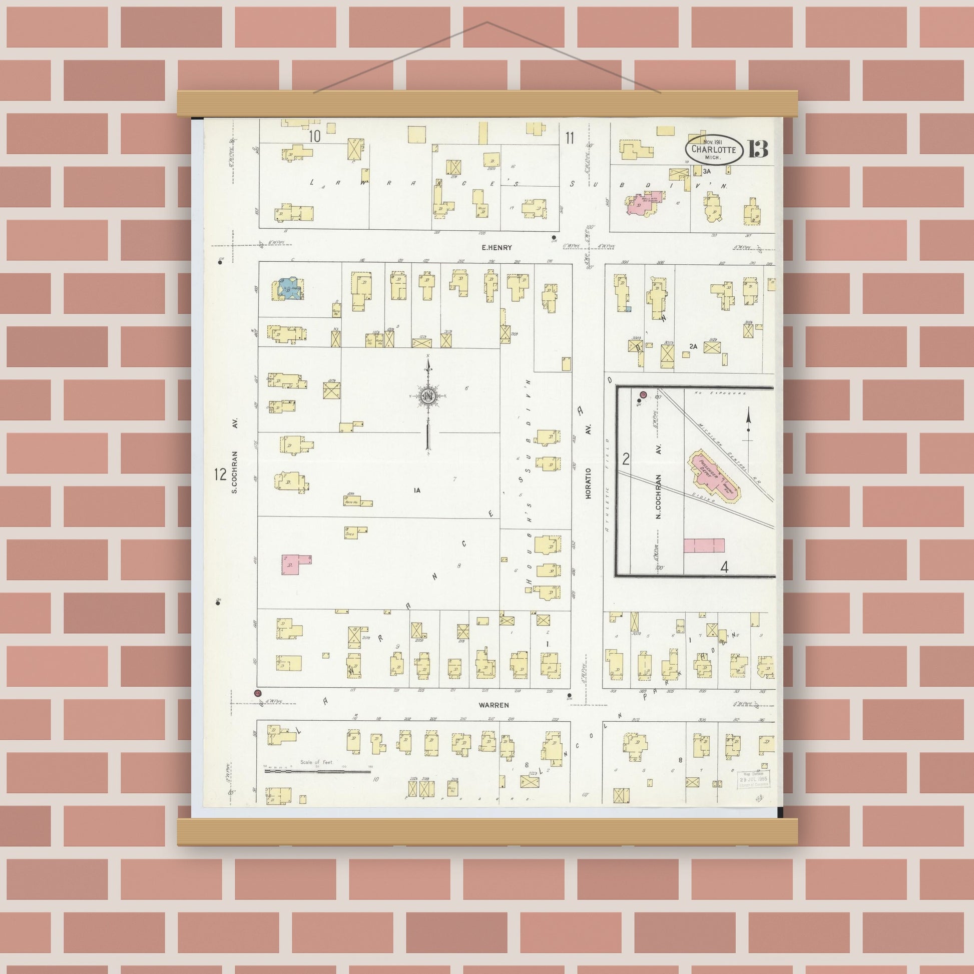 Old map wall art mockup — magnetic wood frame on brick wall — Sanborn Fire Insurance Map from Charlotte, Eaton County, Michigan (1911), Sheet #0013