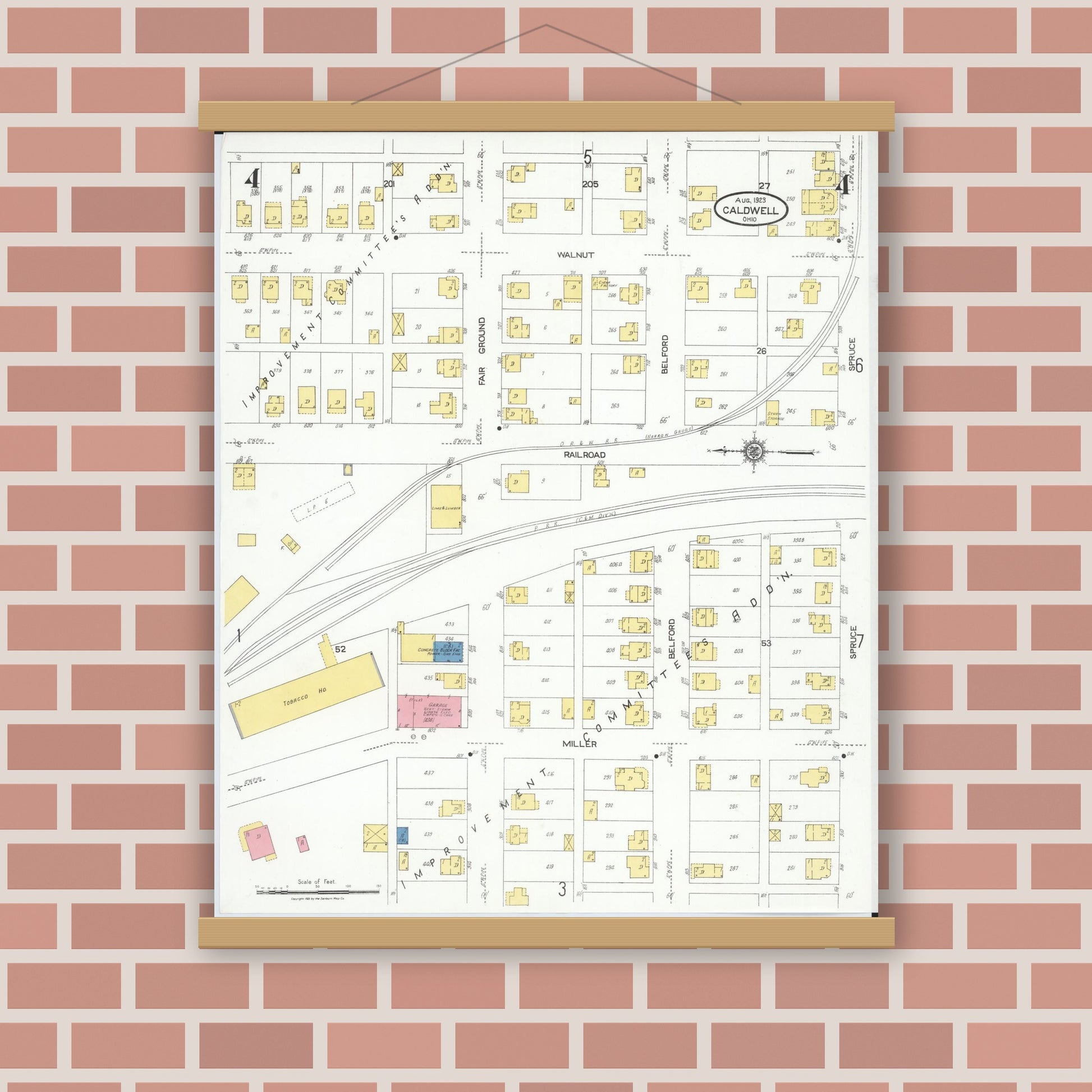 Old map wall art mockup — magnetic wood frame on brick wall — Sanborn Fire Insurance Map from Caldwell, Noble County, Ohio (1923), Sheet #0004