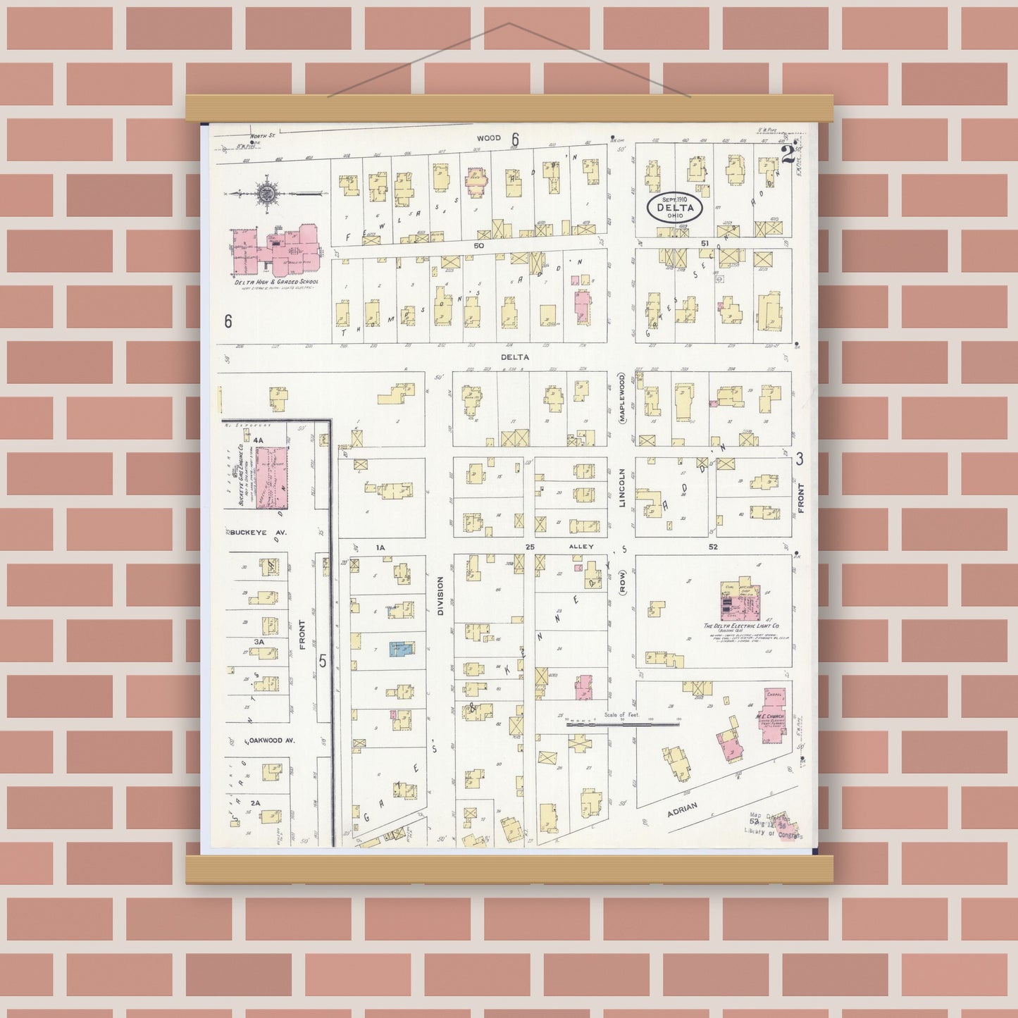 Old map wall art mockup — magnetic wood frame on brick wall — Sanborn Fire Insurance Map from Delta, Fulton County, Ohio (1910), Sheet #0002