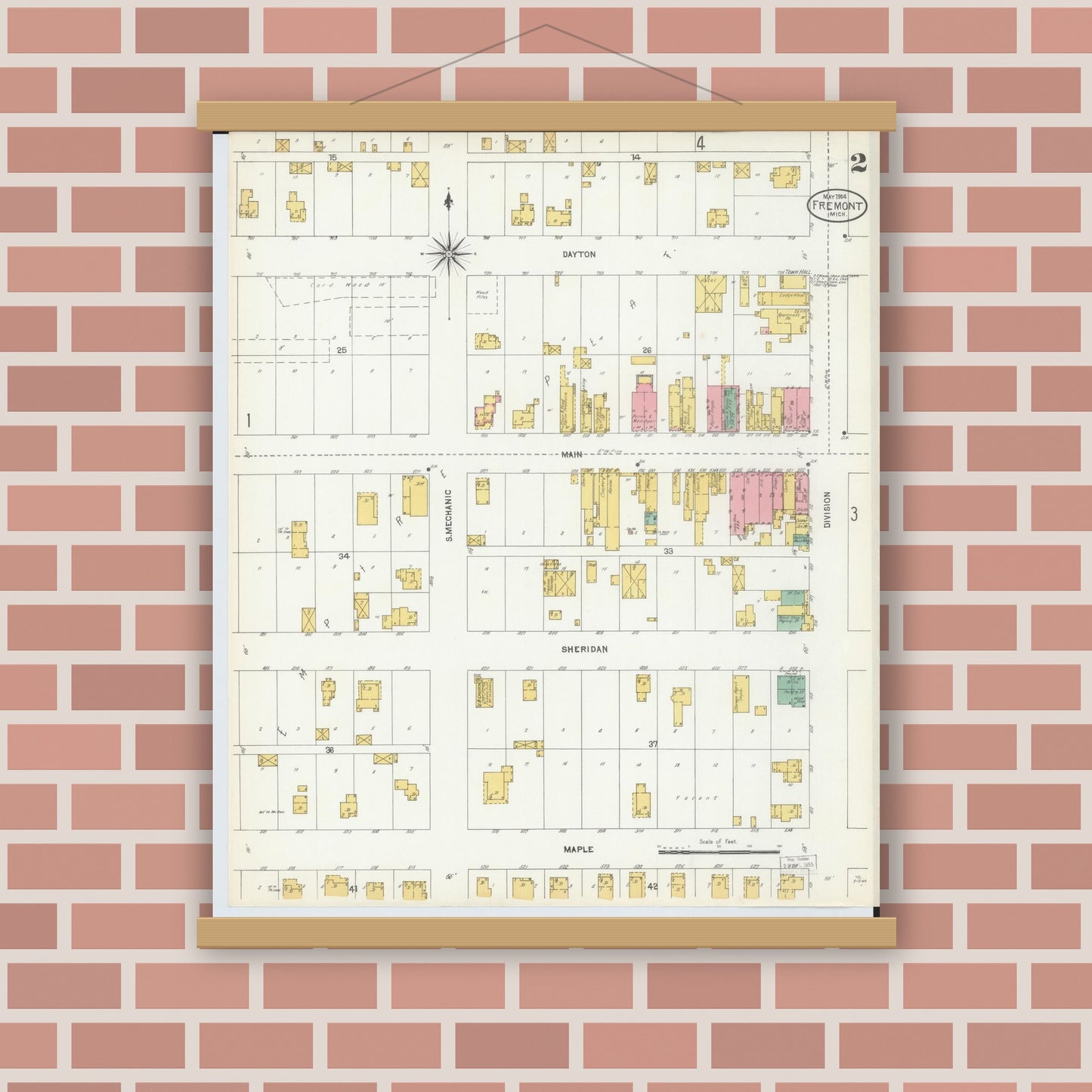 Old map wall art mockup — magnetic wood frame on brick wall — Sanborn Fire Insurance Map from Fremont, Newaygo County, Michigan (1904), Sheet #0002