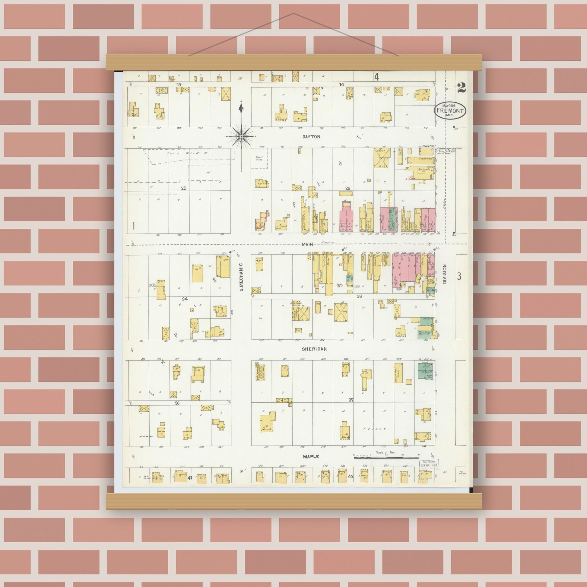 Old map wall art mockup — magnetic wood frame on brick wall — Sanborn Fire Insurance Map from Fremont, Newaygo County, Michigan (1904), Sheet #0002