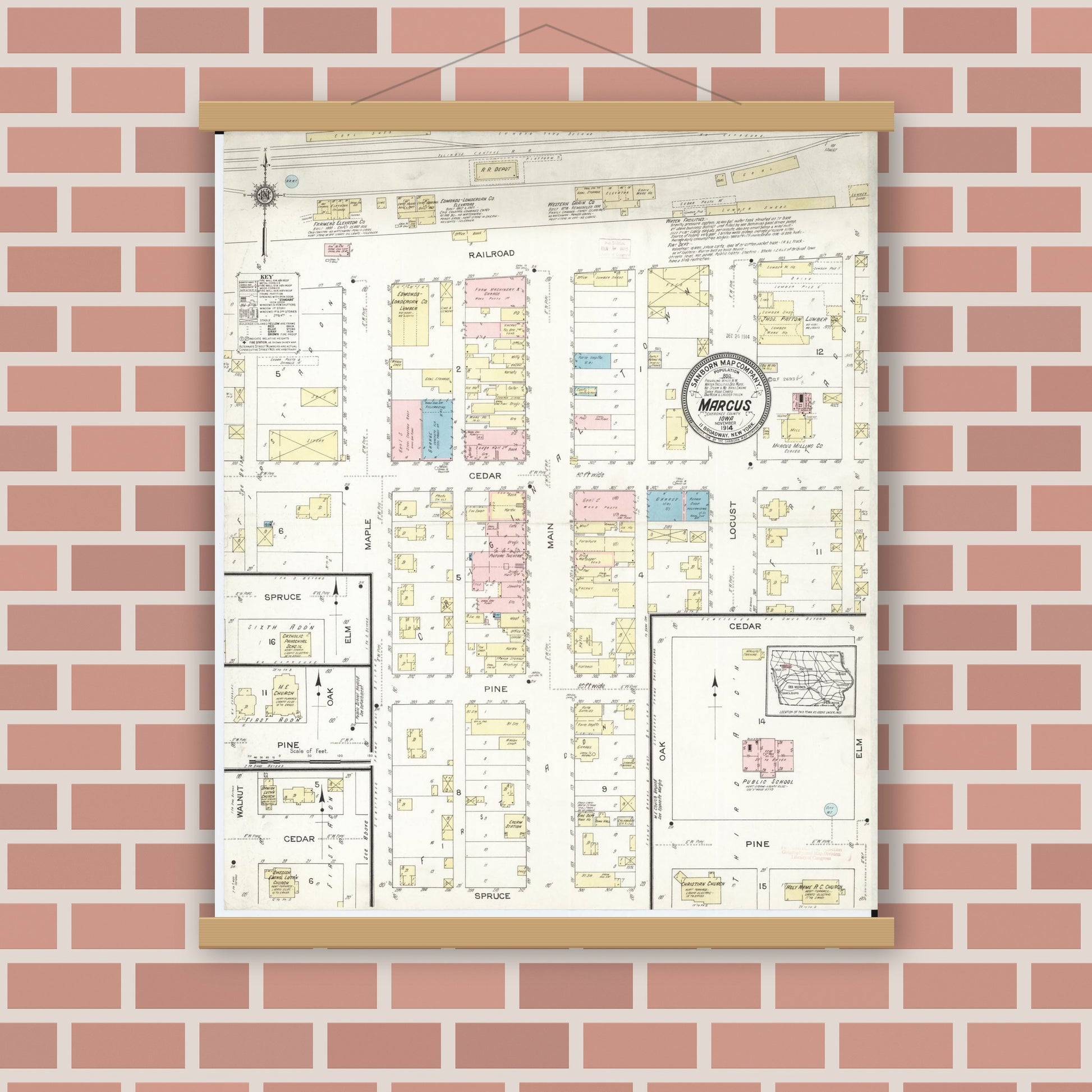 Old map wall art mockup — magnetic wood frame on brick wall — Sanborn Fire Insurance Map from Marcus, Cherokee County, Iowa (1914), Sheet #0001