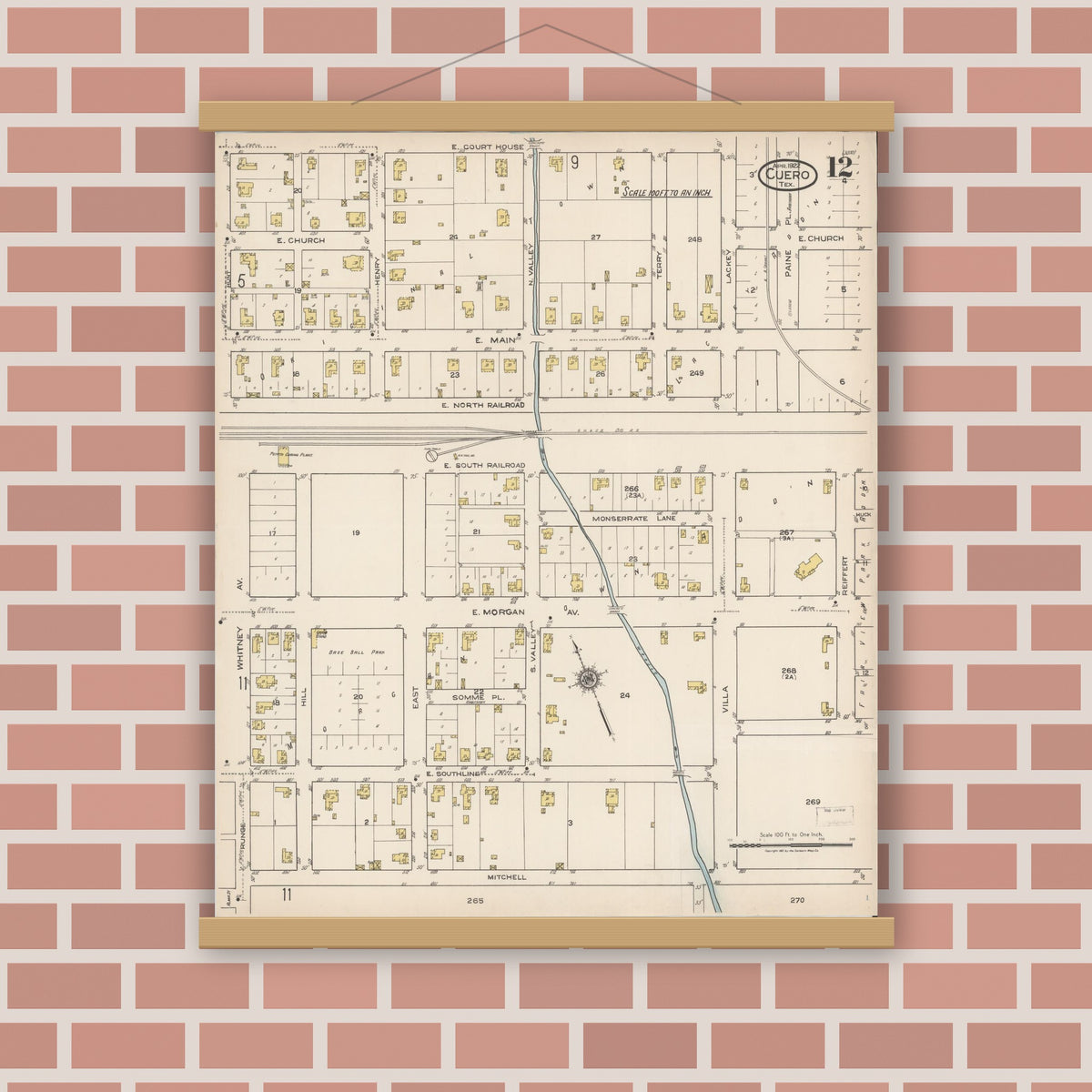 Old map wall art mockup — magnetic wood frame on brick wall — Sanborn Fire Insurance Map from Cuero, De Witt County, Texas (1922), Sheet #0012