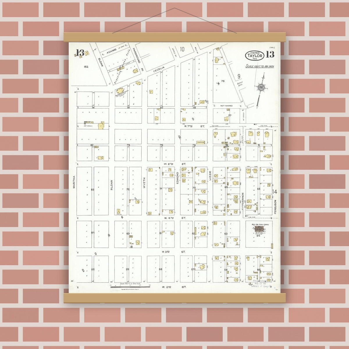 Old map wall art mockup — magnetic wood frame on brick wall — Sanborn Fire Insurance Map from Taylor, Williamson County, Texas (1923), Sheet #0013