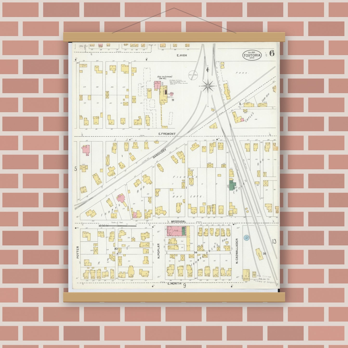 Old map wall art mockup — magnetic wood frame on brick wall — Sanborn Fire Insurance Map from Fostoria, Seneca, Hancock, And Wood Counties, Ohio (1901), Sheet #0006