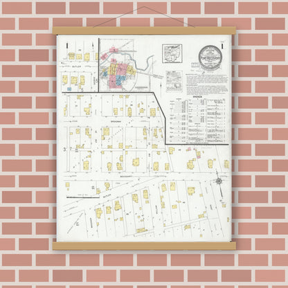 Old map wall art mockup — magnetic wood frame on brick wall — Sanborn Fire Insurance Map from Fort Recovery, Mercer County, Ohio (1927), Sheet #0001