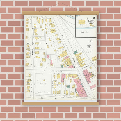 Old map wall art mockup — magnetic wood frame on brick wall — Sanborn Fire Insurance Map from Lorain, Lorain County, Ohio (1900), Sheet #0002