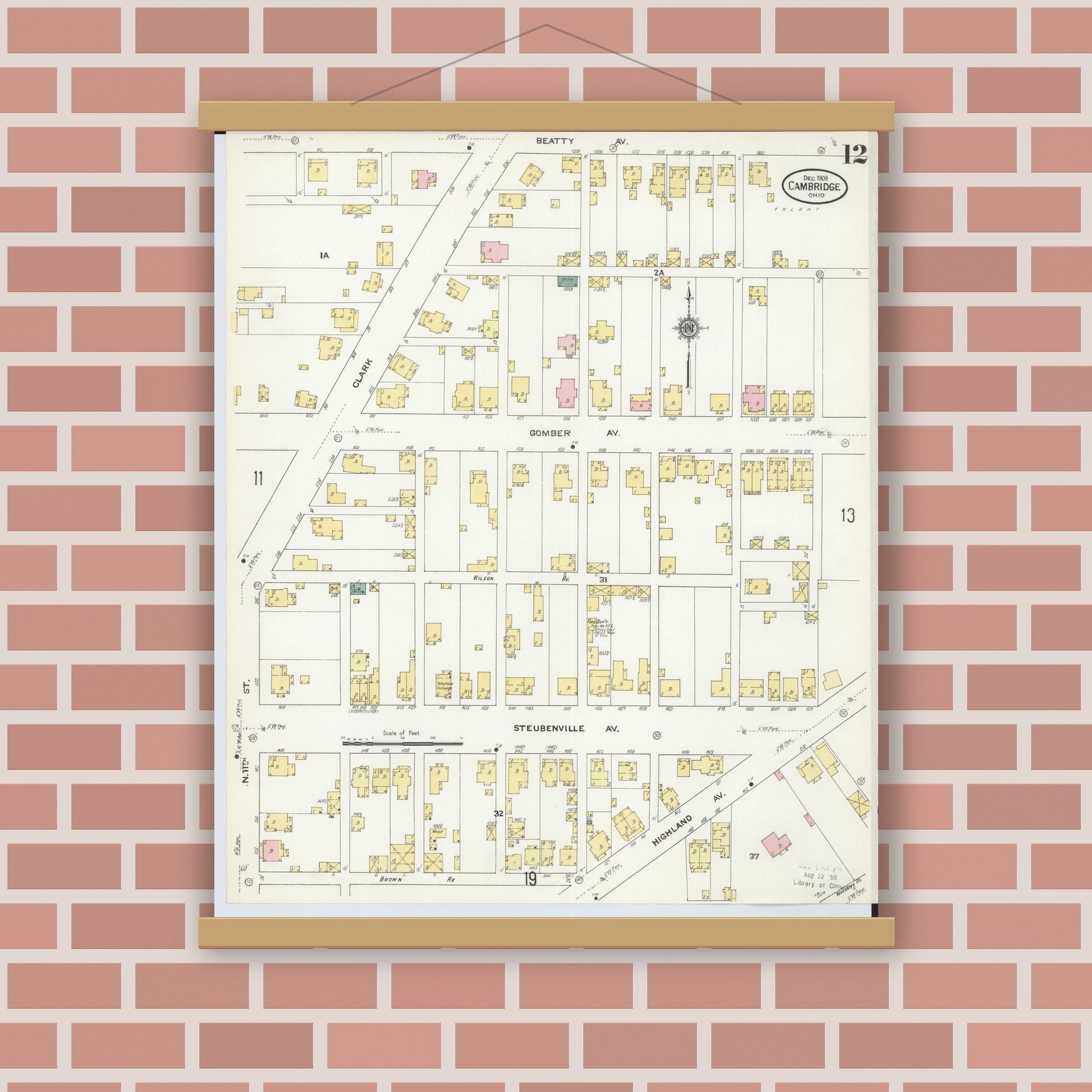 Old map wall art mockup — magnetic wood frame on brick wall — Sanborn Fire Insurance Map from Cambridge, Guernsey County, Ohio (1909), Sheet #0012
