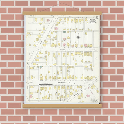 Old map wall art mockup — magnetic wood frame on brick wall — Sanborn Fire Insurance Map from Cambridge, Guernsey County, Ohio (1909), Sheet #0012