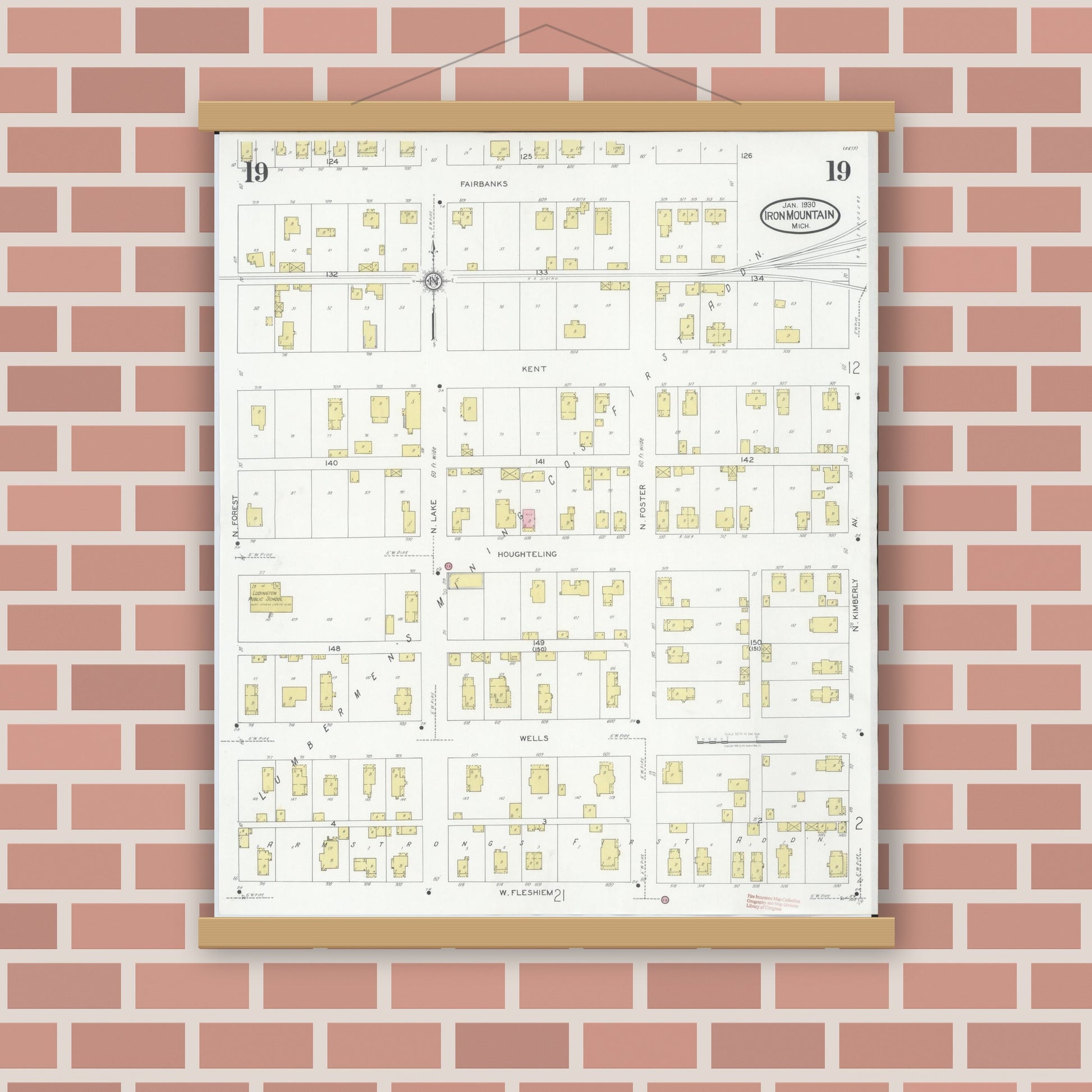 Old map wall art mockup — magnetic wood frame on brick wall — Sanborn Fire Insurance Map from Iron Mountain, Dickinson County, Michigan (1930), Sheet #0019