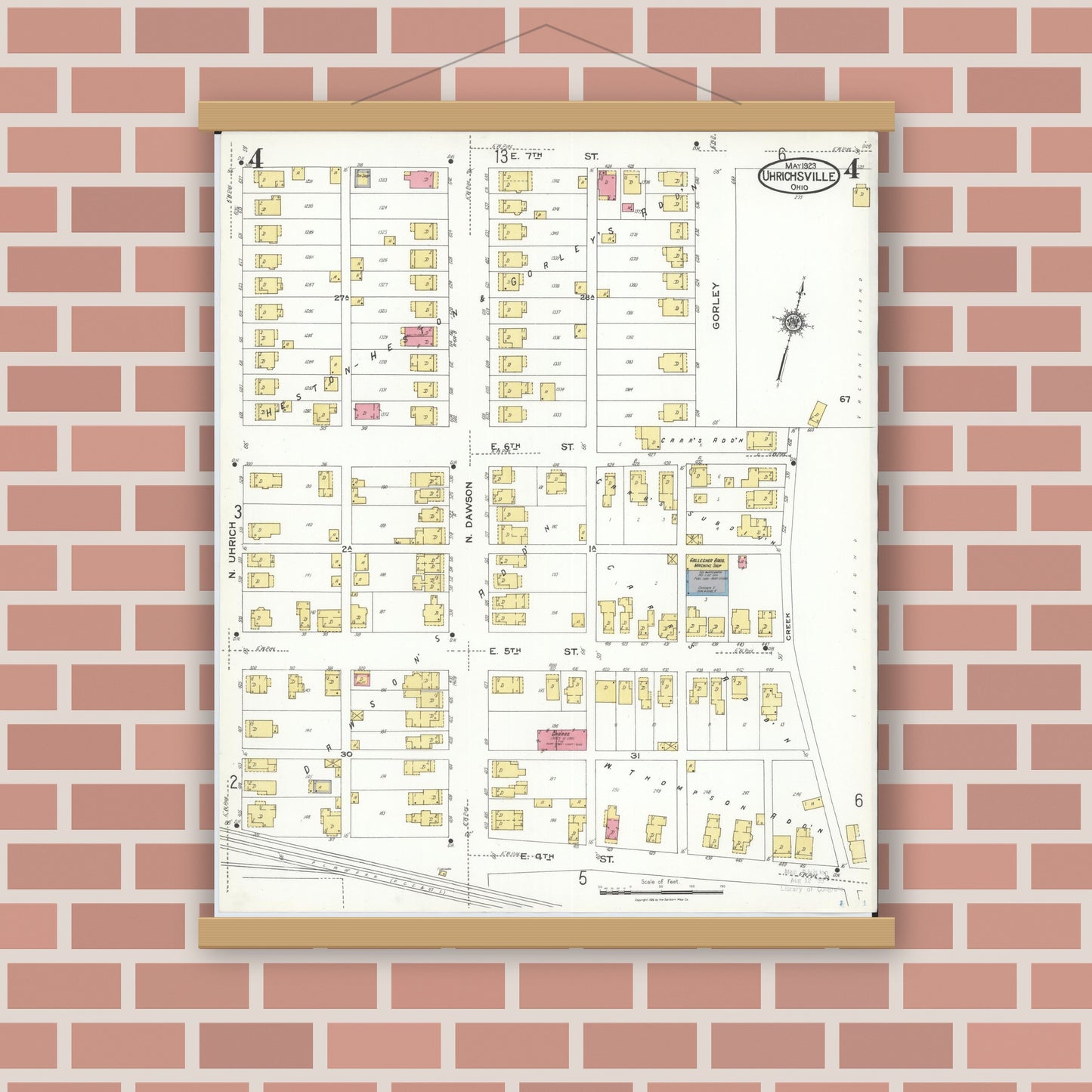 Old map wall art mockup — magnetic wood frame on brick wall — Sanborn Fire Insurance Map from Uhrichsville, Tuscarawas County, Ohio (1923), Sheet #0004