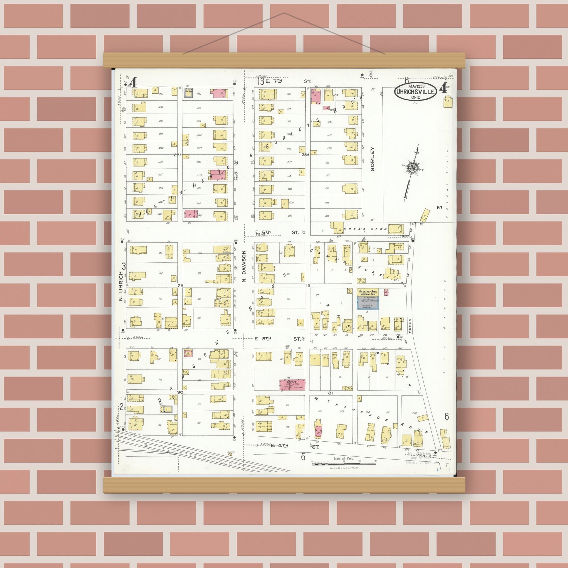Old map wall art mockup — magnetic wood frame on brick wall — Sanborn Fire Insurance Map from Uhrichsville, Tuscarawas County, Ohio (1923), Sheet #0004