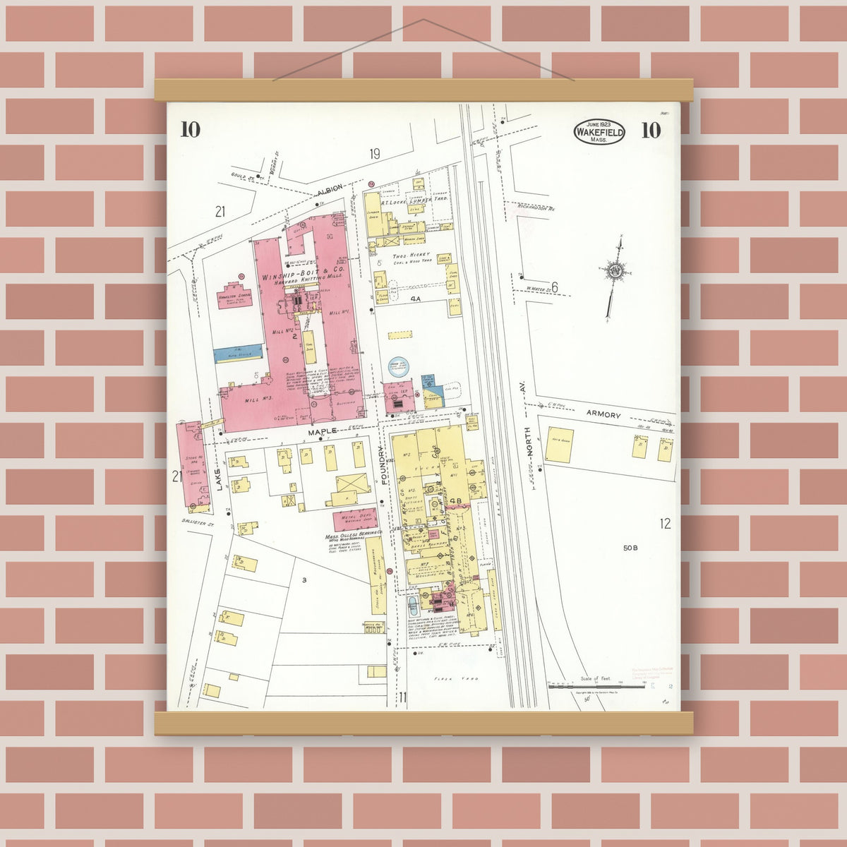 Old map wall art mockup — magnetic wood frame on brick wall — Sanborn Fire Insurance Map from Wakefield, Middlesex County, Massachusetts (1923), Sheet #0010