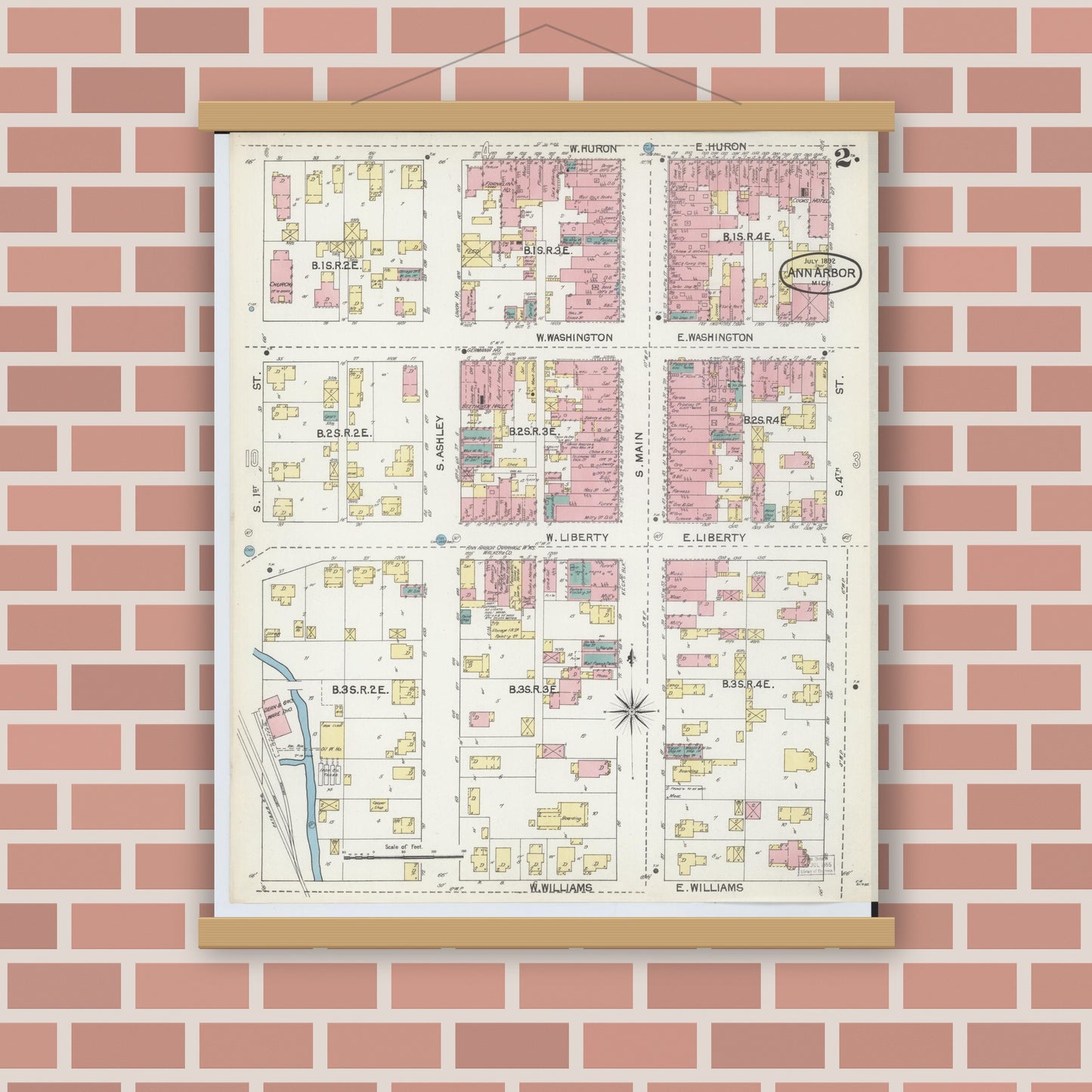Old map wall art mockup — magnetic wood frame on brick wall — Sanborn Fire Insurance Map from Ann Arbor, Washtenaw County, Michigan (1892), Sheet #0002